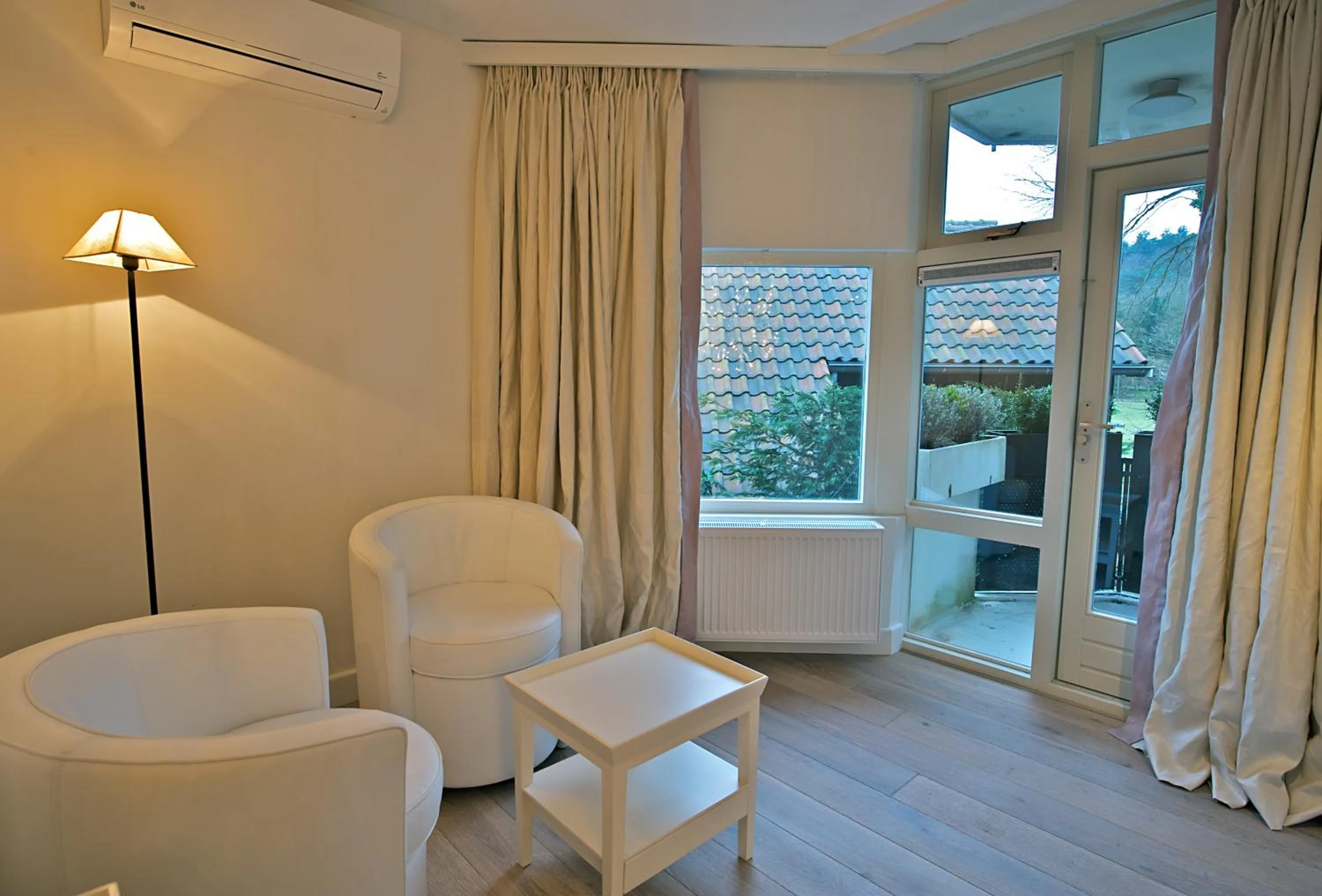 Seating area in Restaurant Hotel Merlet