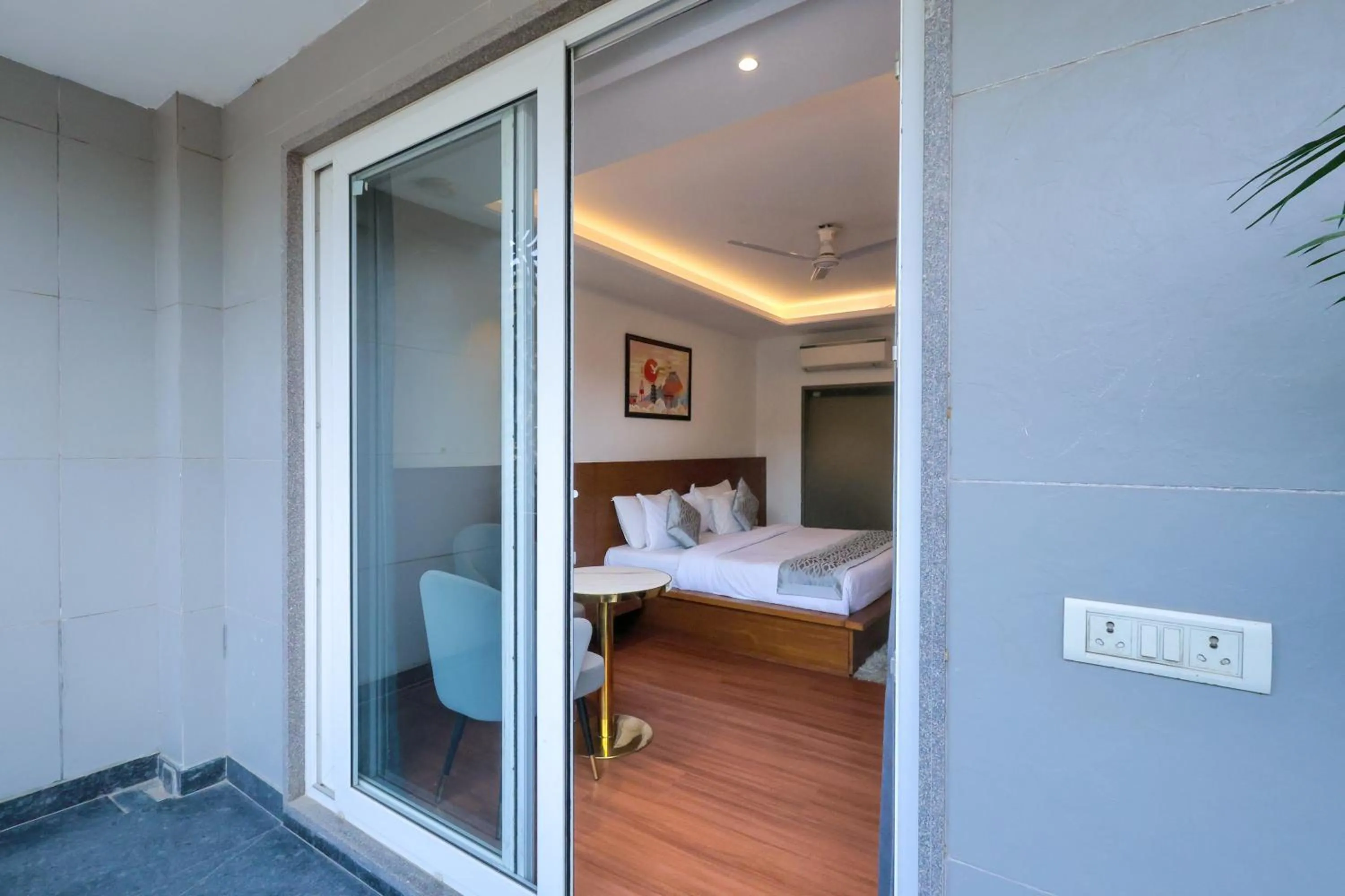 Balcony/Terrace, Bed in Nikko Premier - Near Medanta Hospital