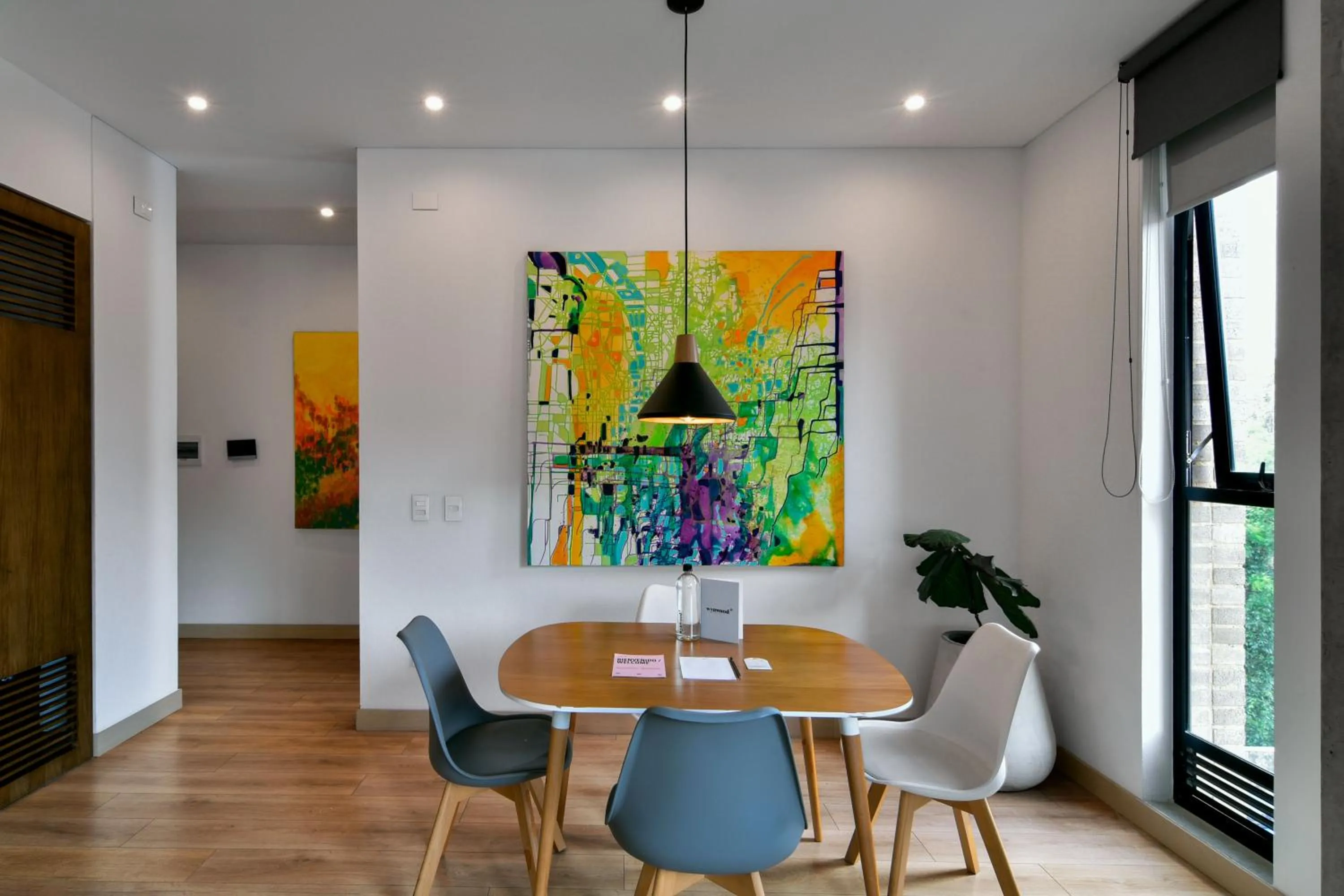 Dining area in Canvas By Wynwood House