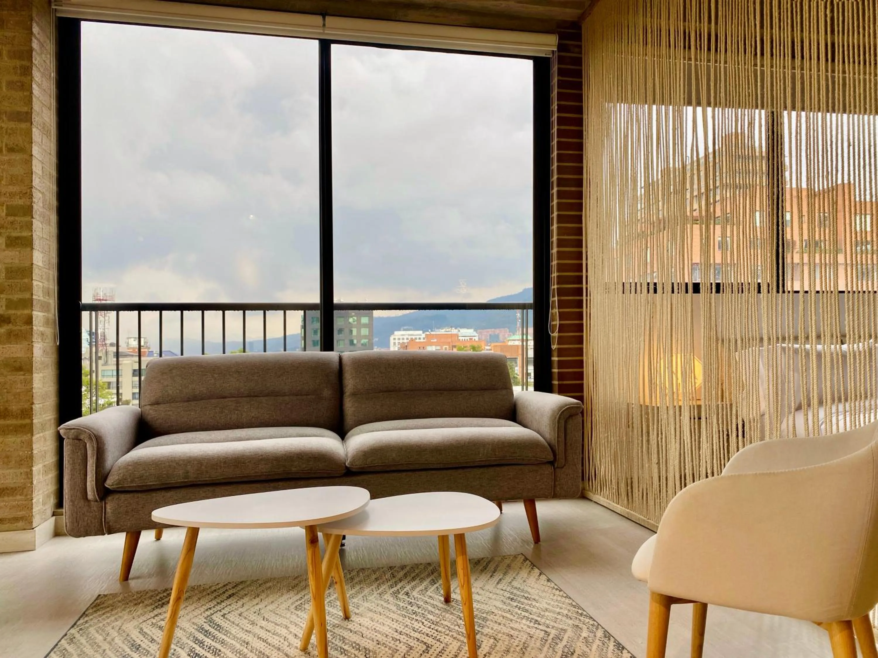 Seating area in Canvas By Wynwood House