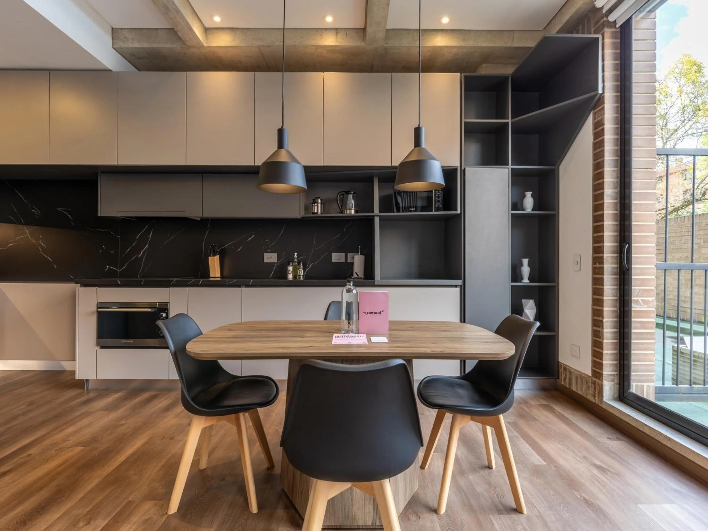 Dining area in Canvas By Wynwood House