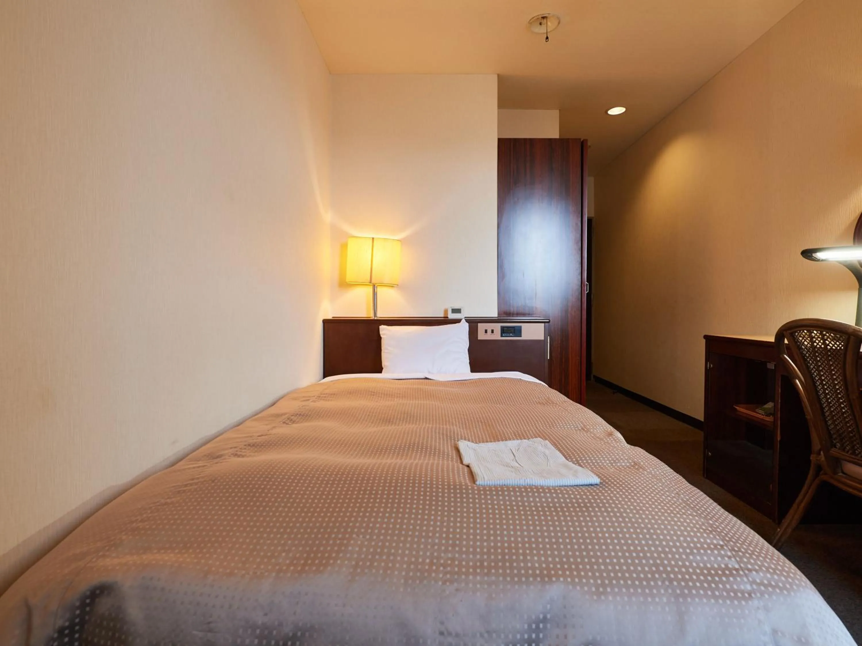 Photo of the whole room, Bed in Tabist Hotel New Central