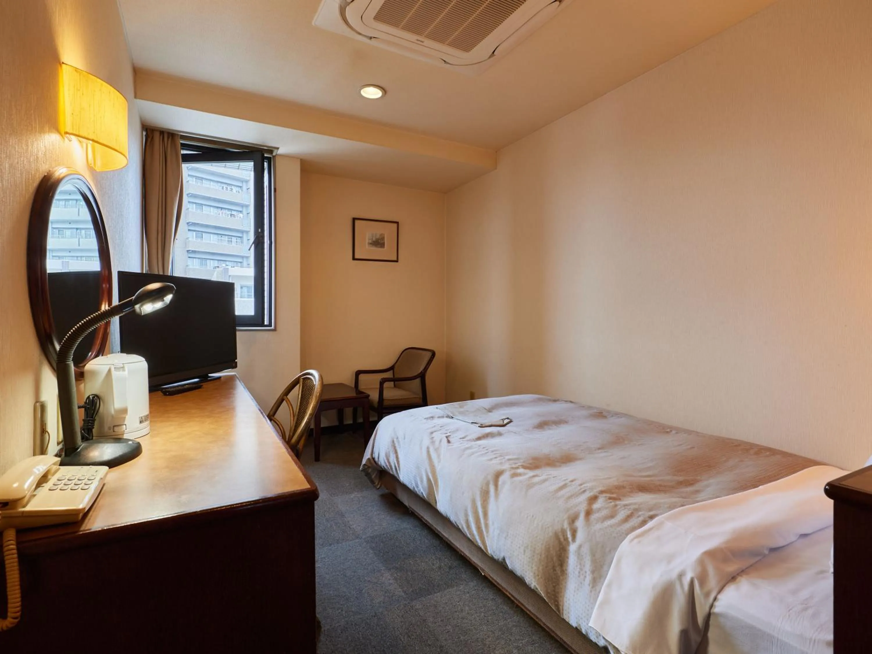 Photo of the whole room, Bed in Tabist Hotel New Central