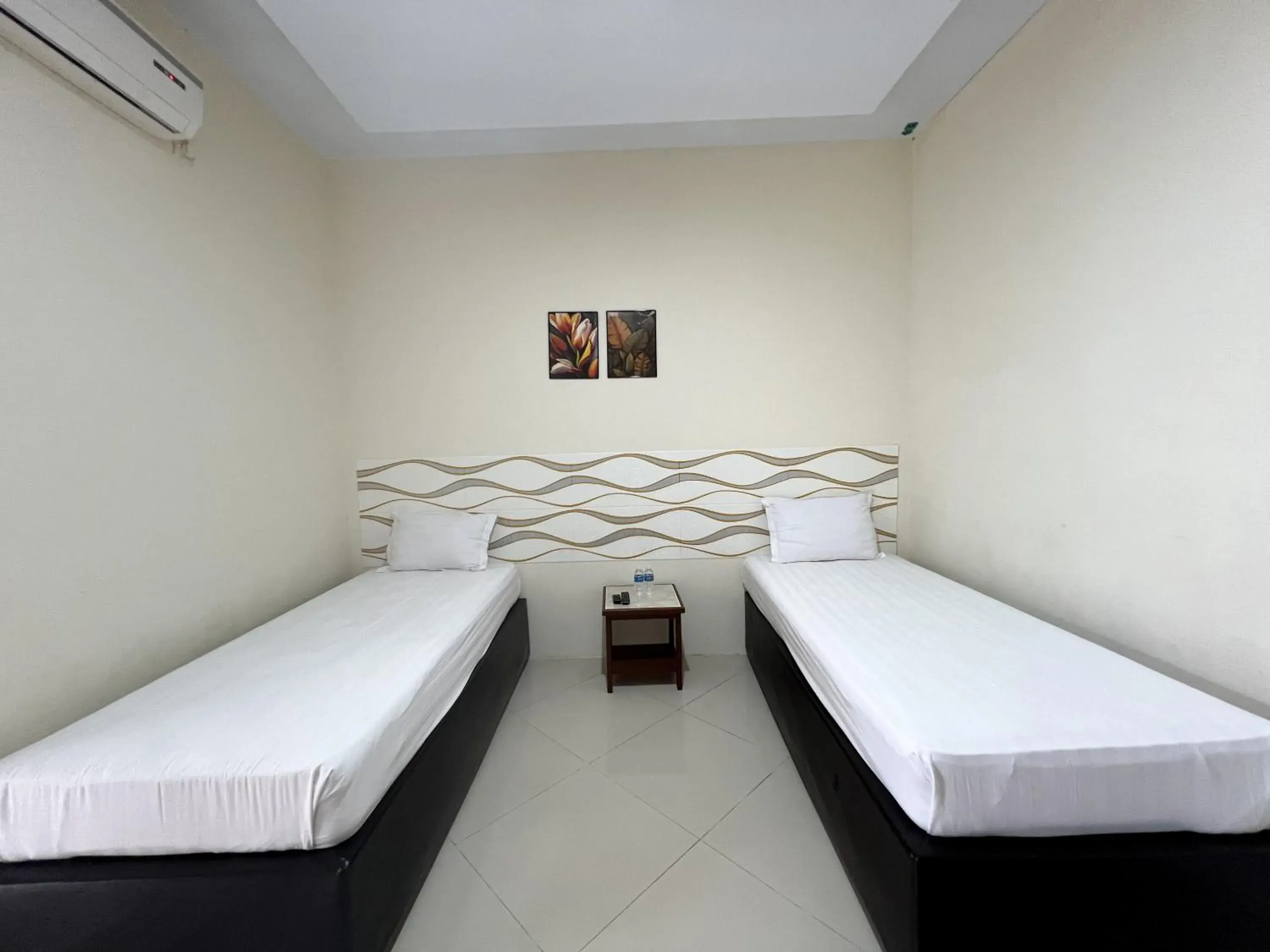 Twin Room in Filia Syariah Homestay Palu RedPartner Twin Room in Filia Syariah Homestay Palu RedPartner