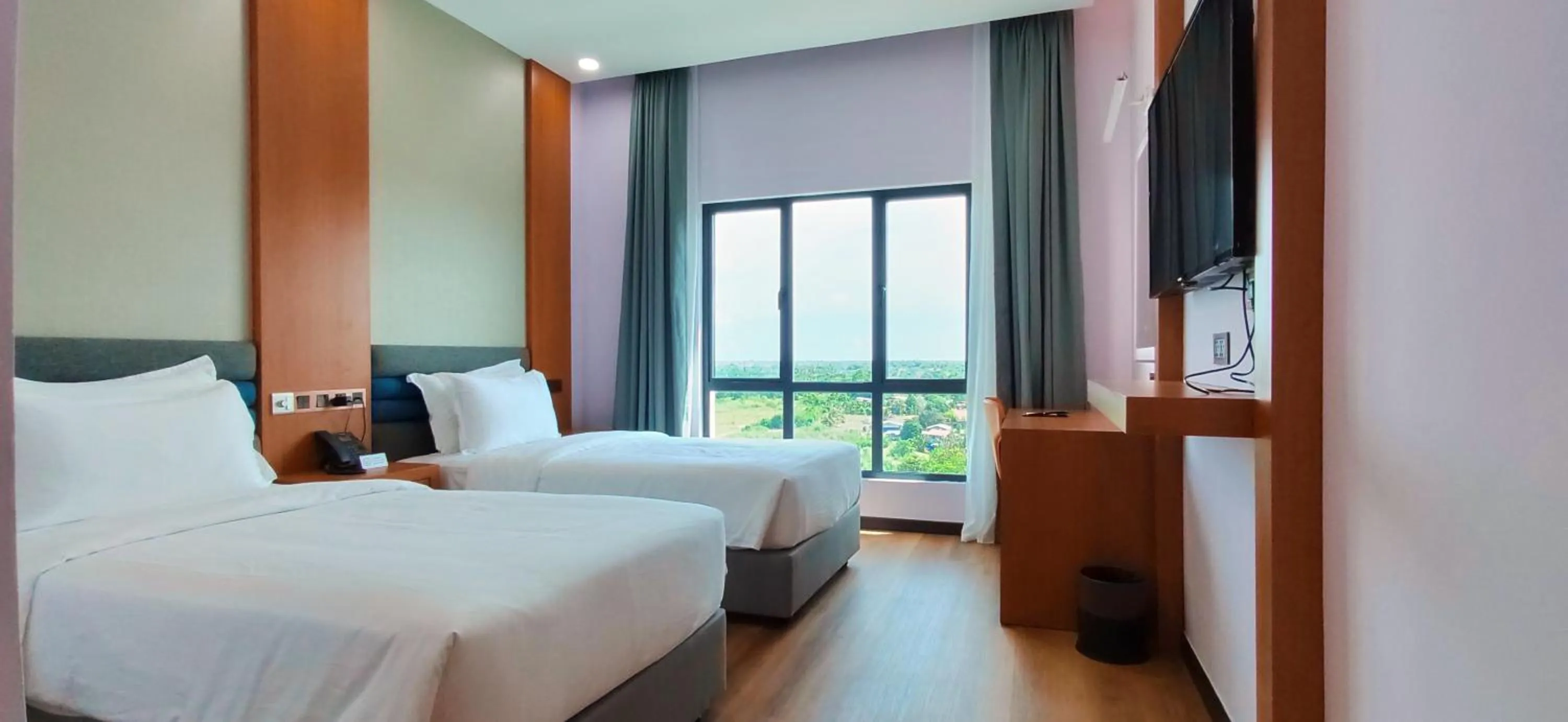 Bed in Hotel Kapalai Semporna