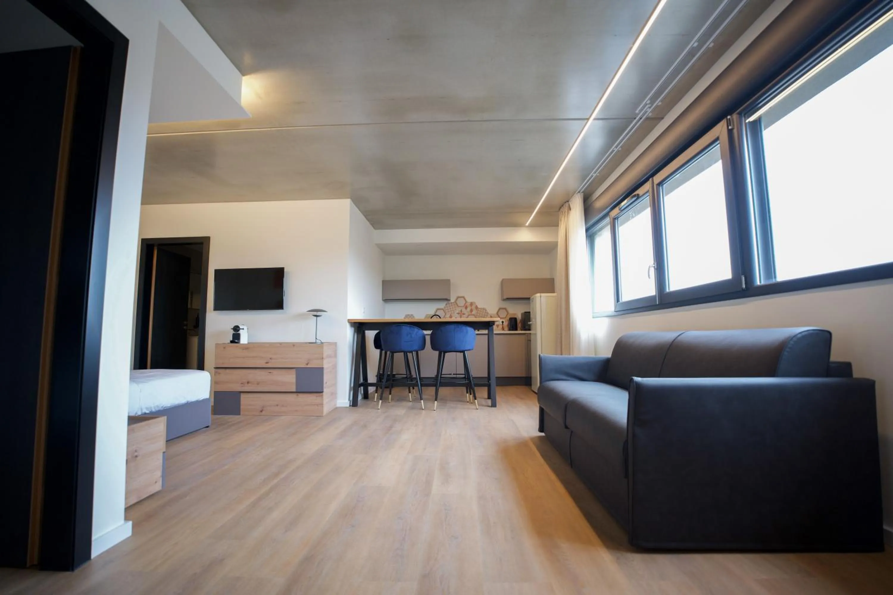 Communal lounge/ TV room in Arrow Hôtel