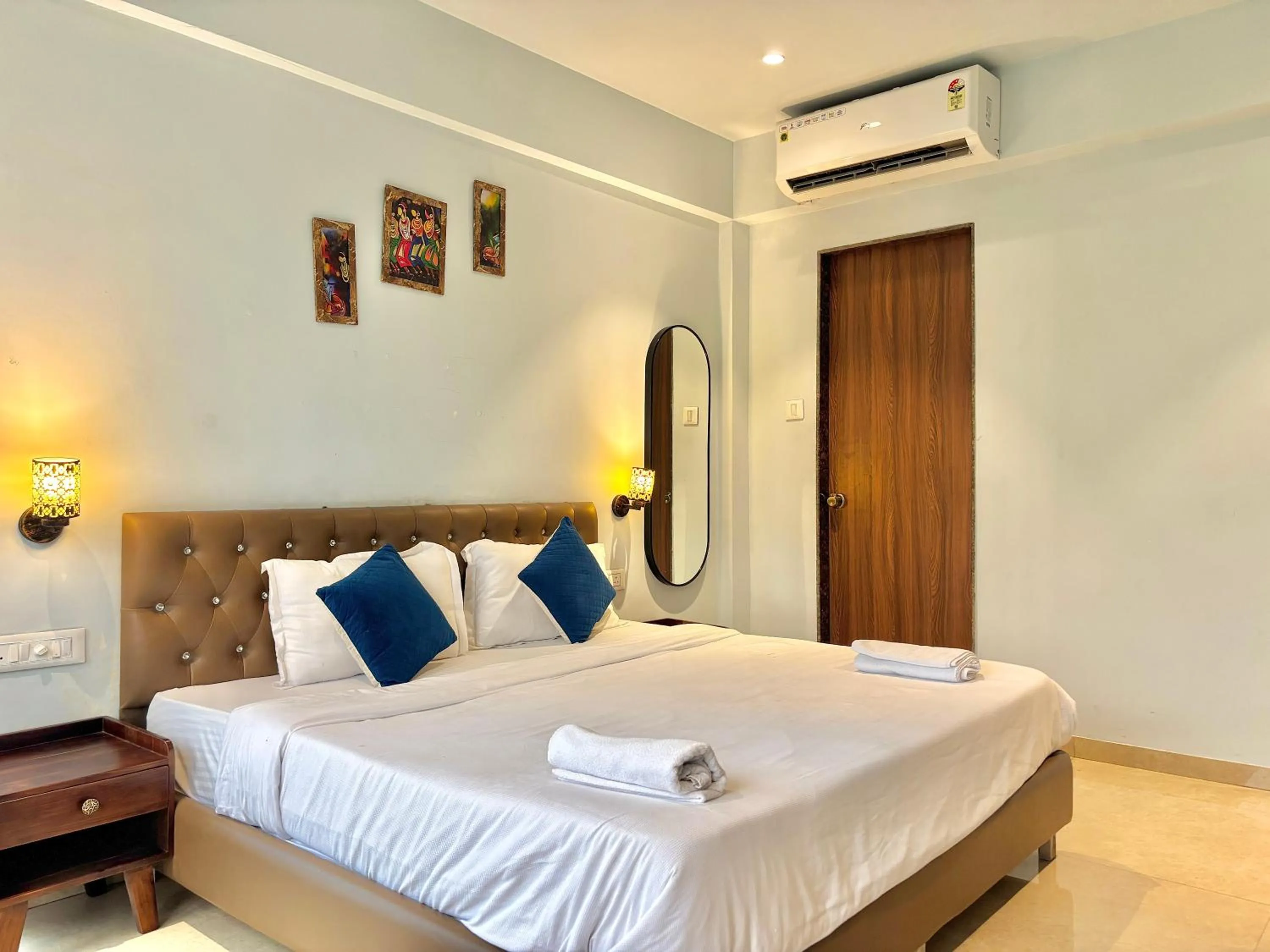 Bed in Misty Blues Resort & Villas