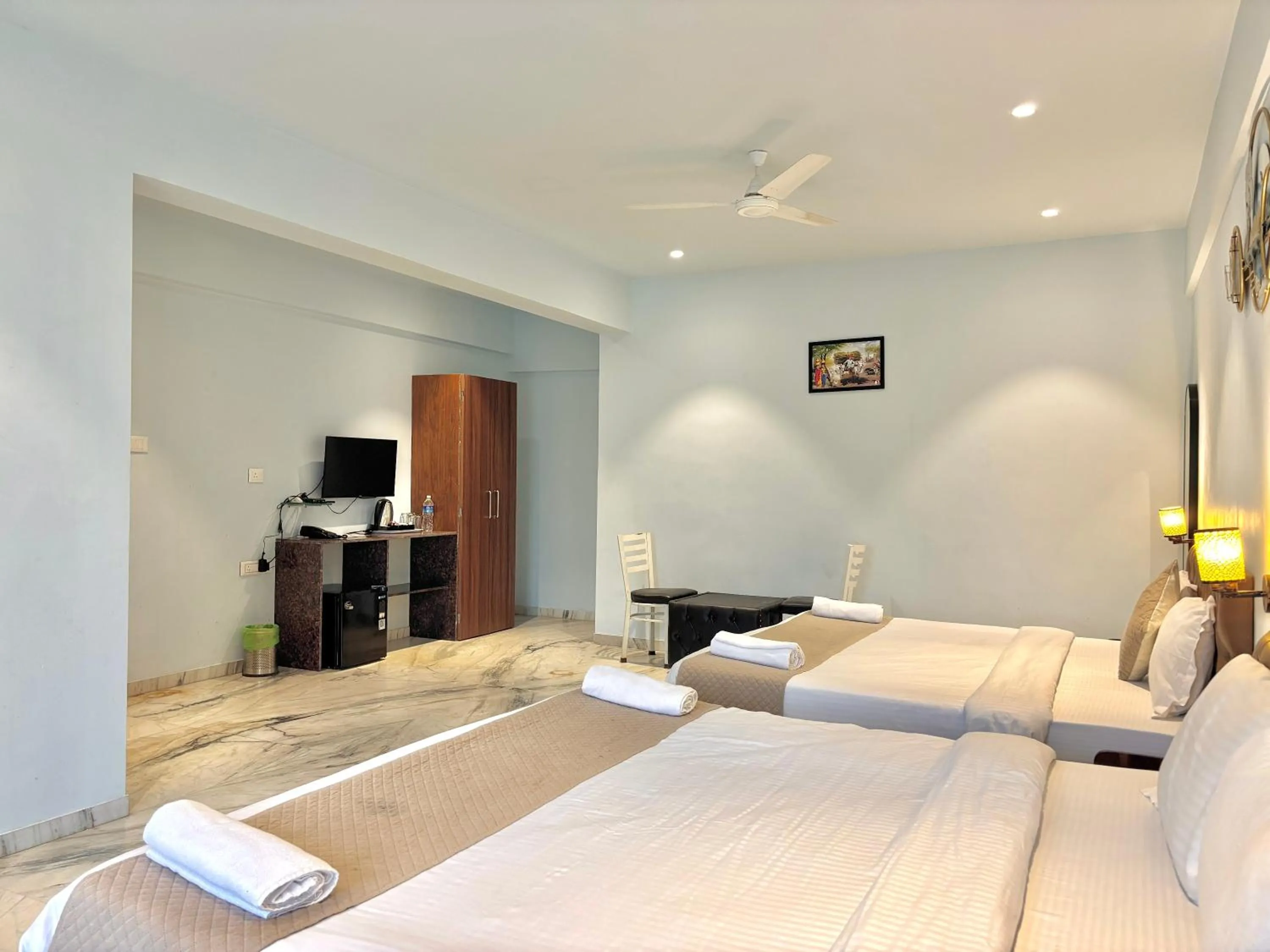 Bed in Misty Blues Resort & Villas