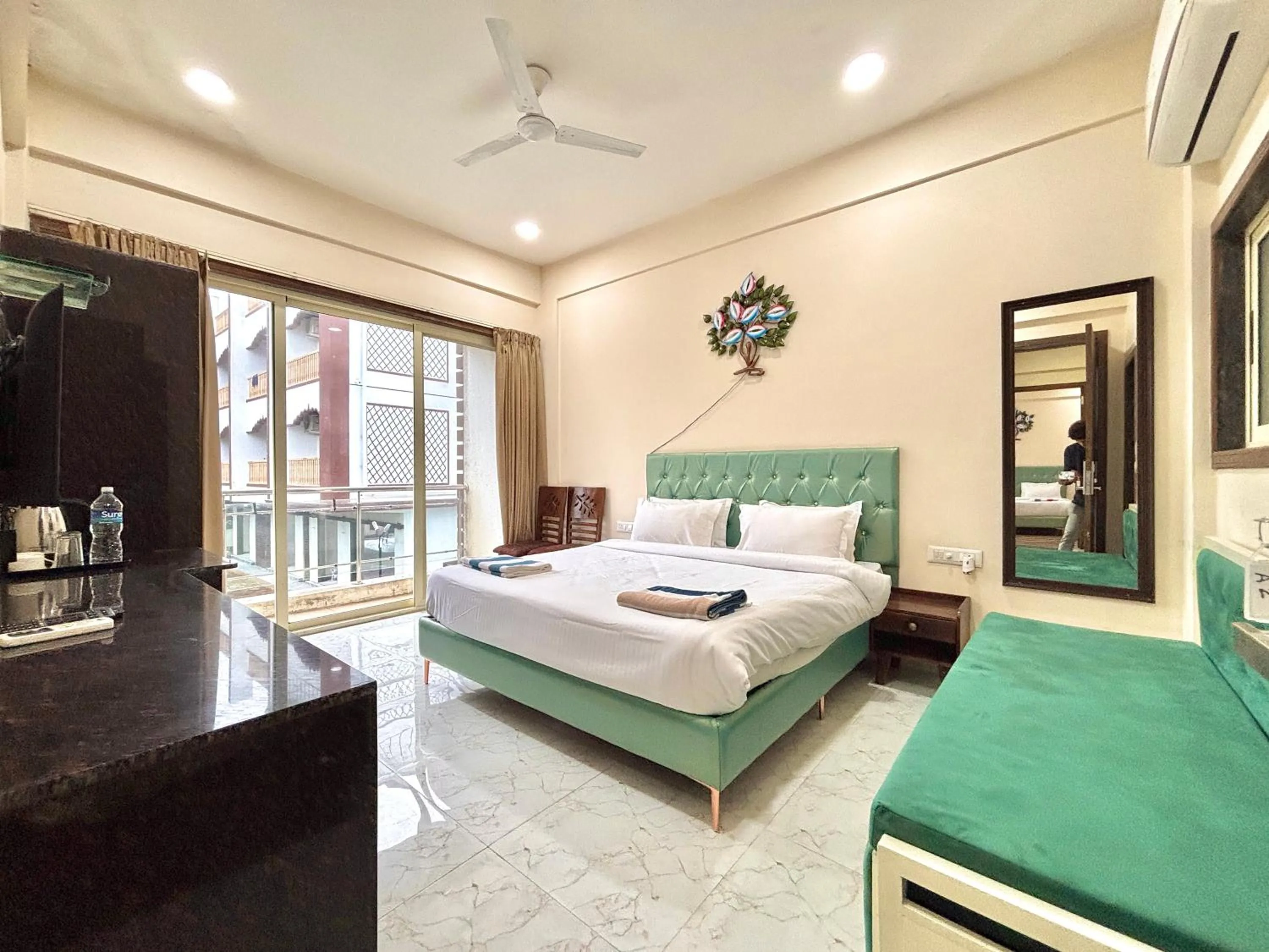 Bed in Misty Blues Resort & Villas