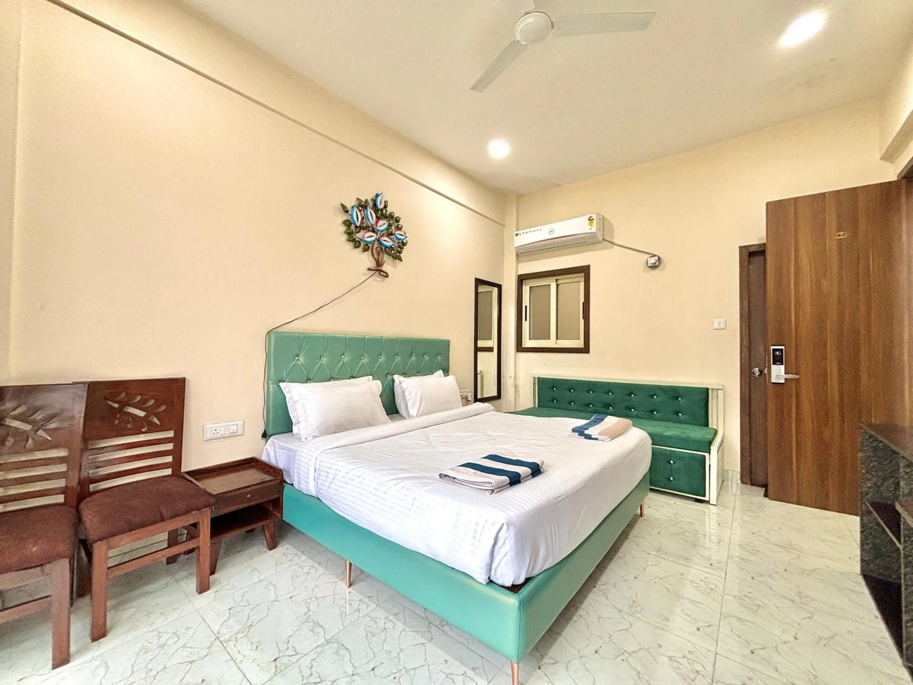 Bed in Misty Blues Resort & Villas