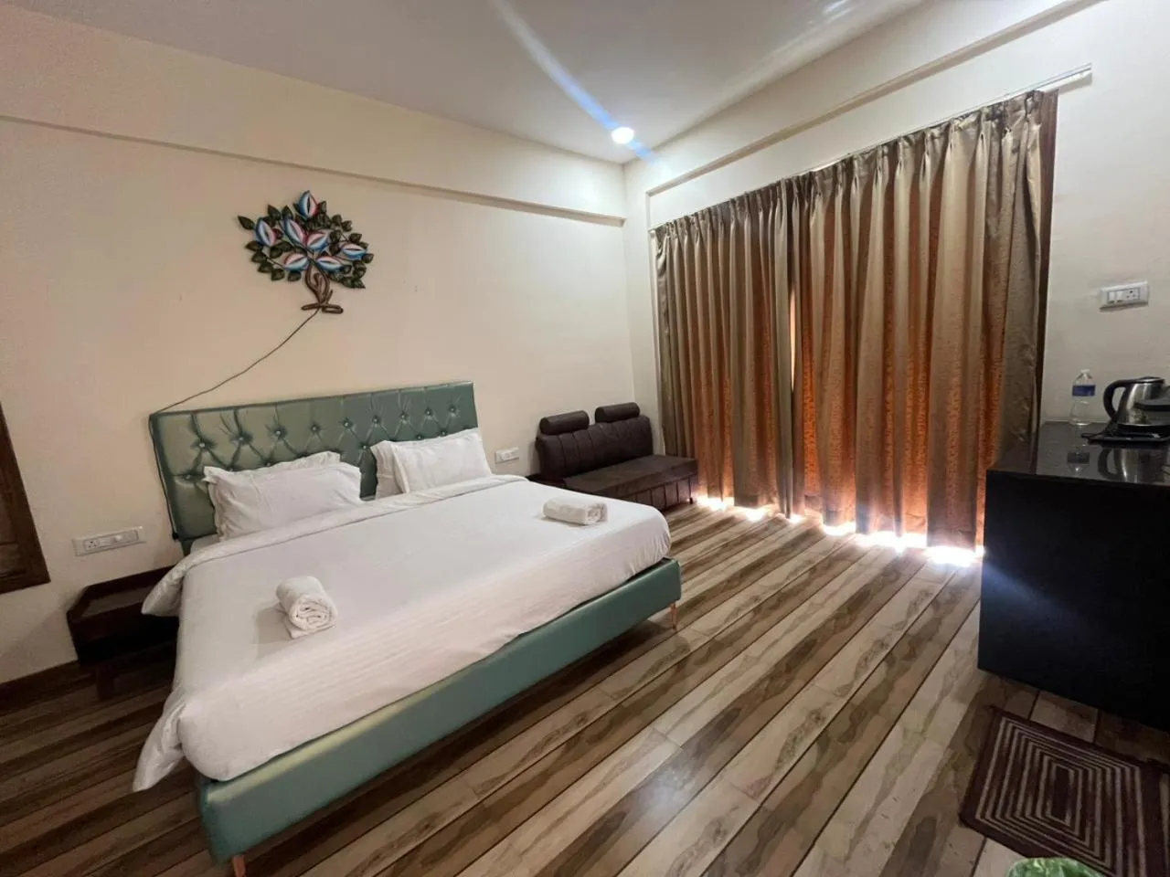 Bed in Misty Blues Resort & Villas