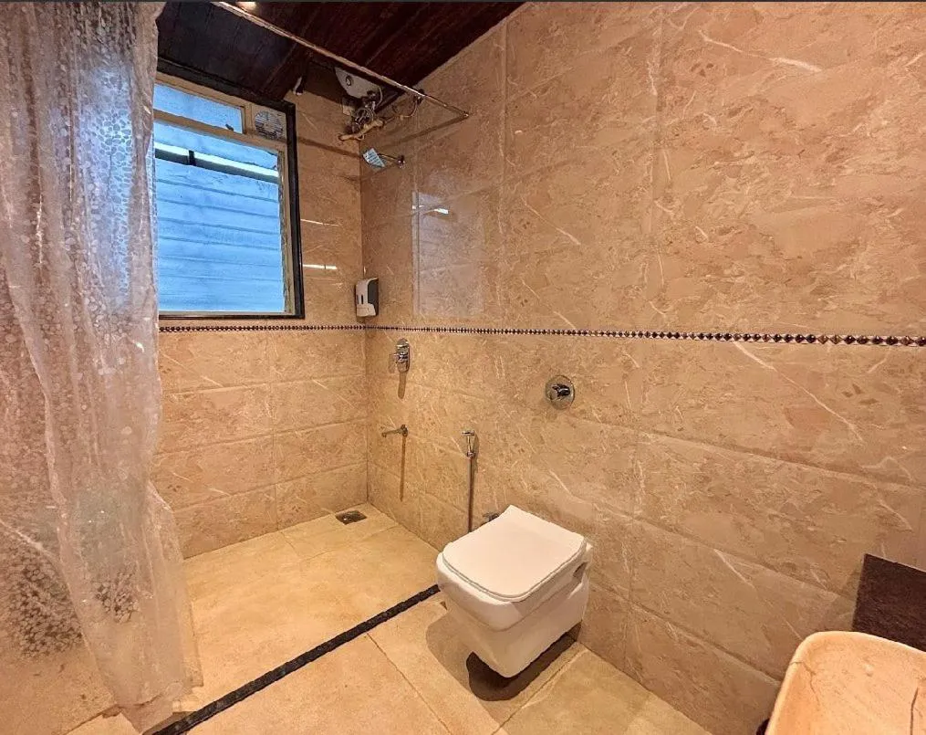 Toilet in Misty Blues Resort & Villas