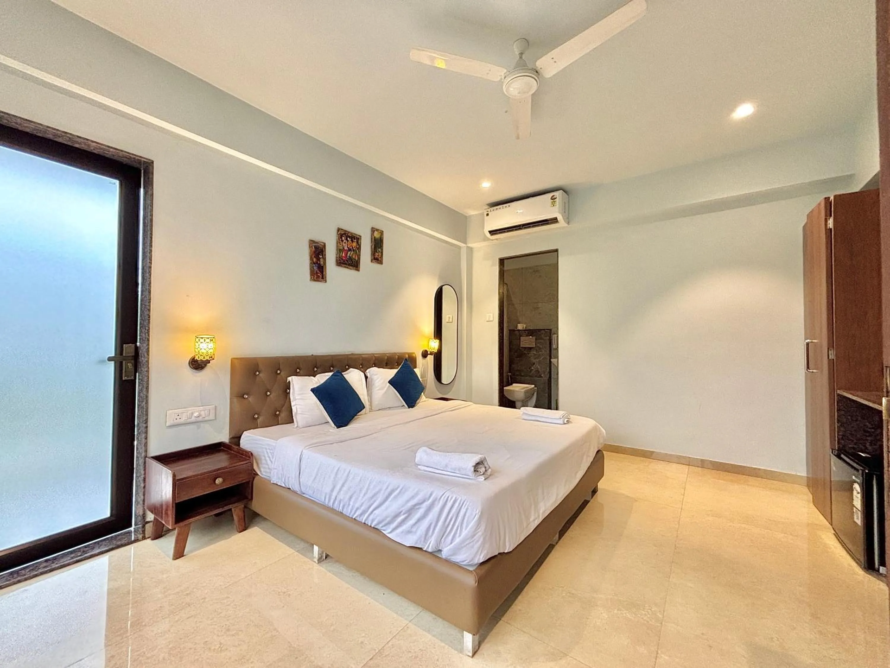 Bed in Misty Blues Resort & Villas