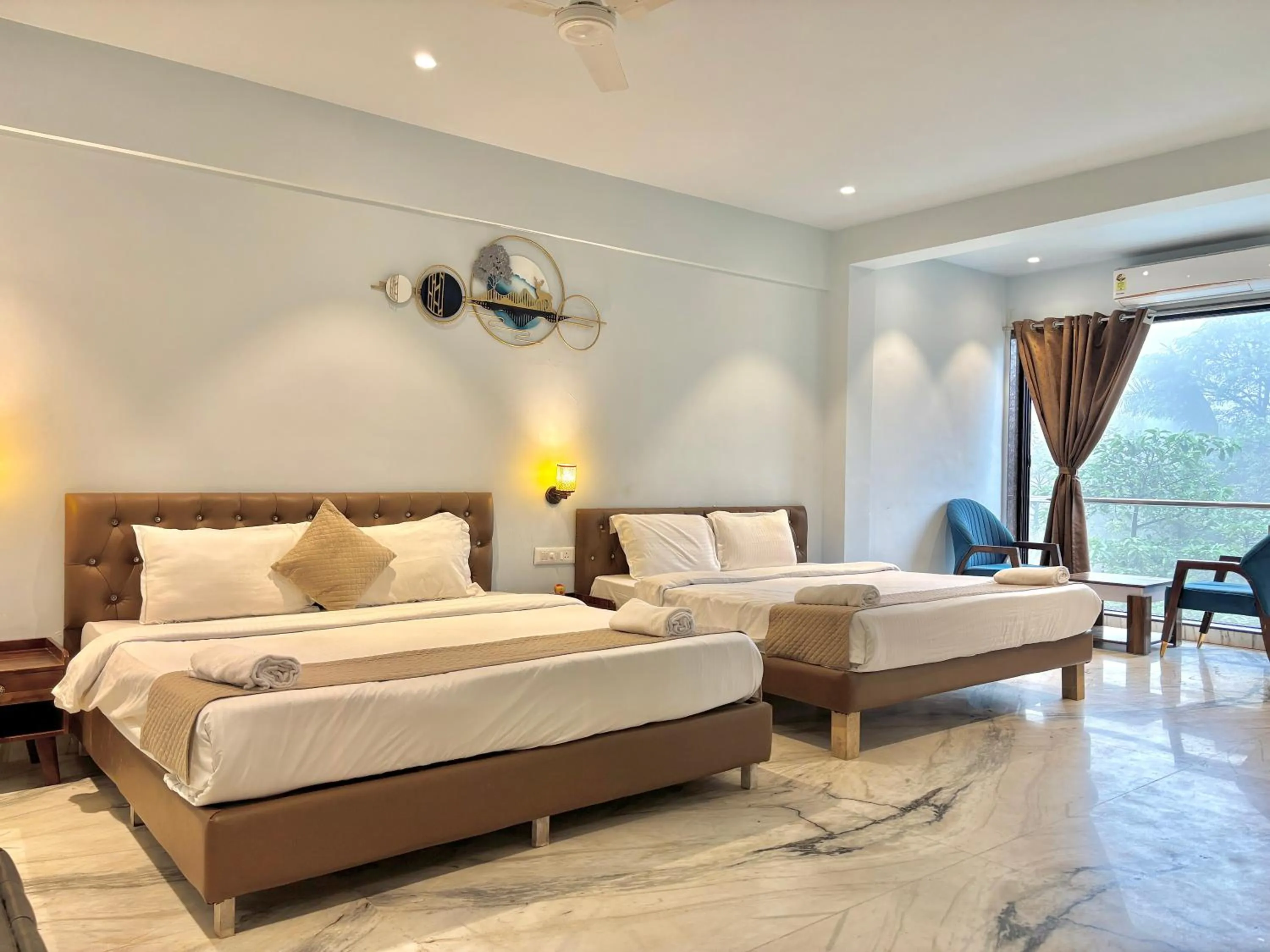Bed in Misty Blues Resort & Villas