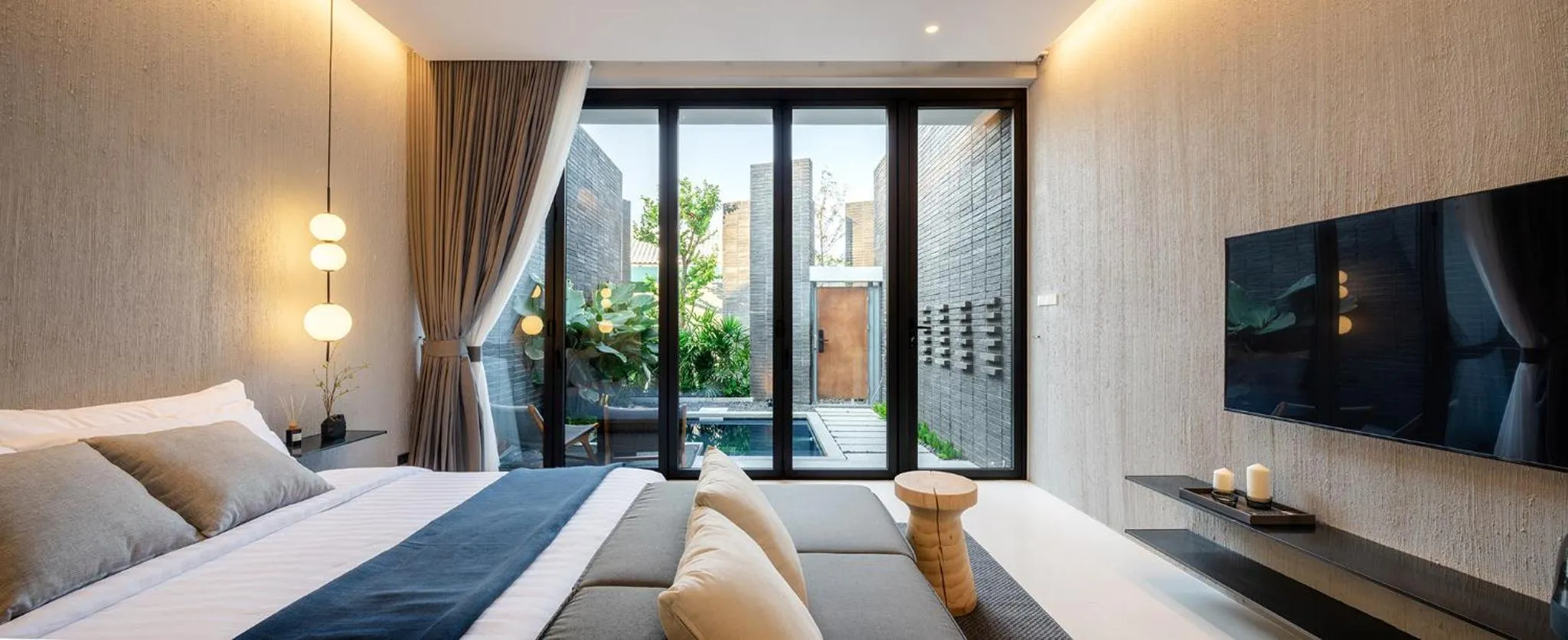 Bed in Rhy.a Private Pool Villa