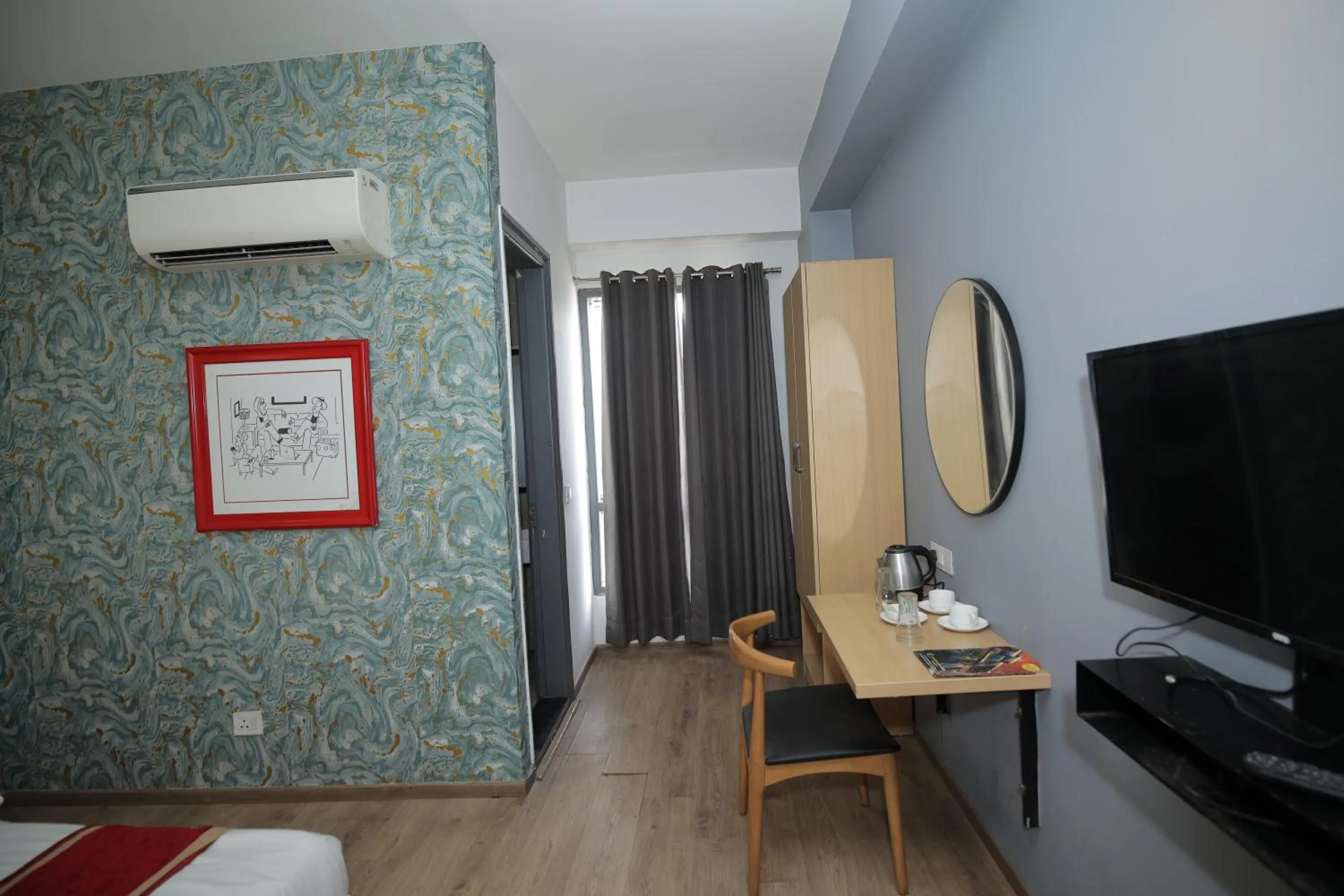TV and multimedia, Bed in Hotel The Anvi Residency Sector 122