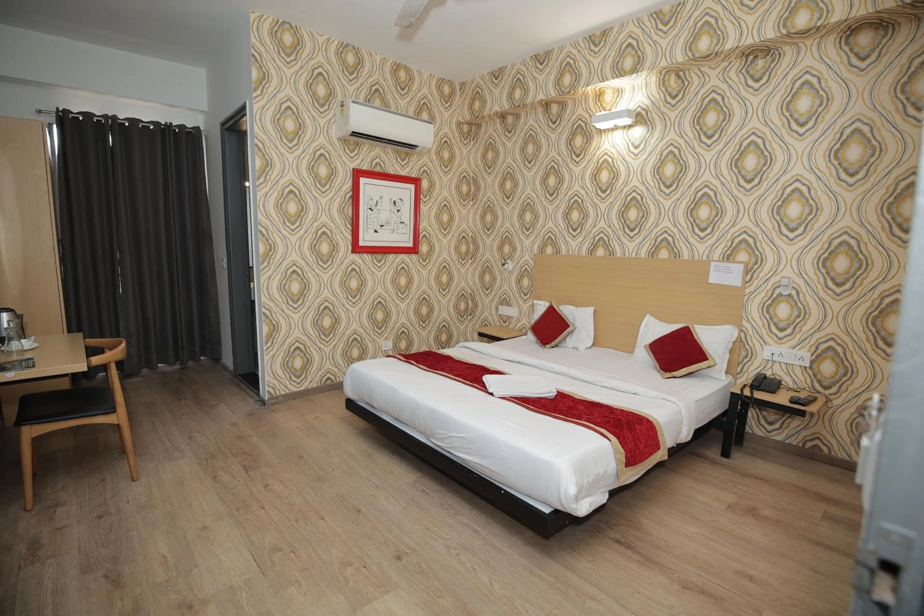 Photo of the whole room, Bed in Hotel The Anvi Residency Sector 122