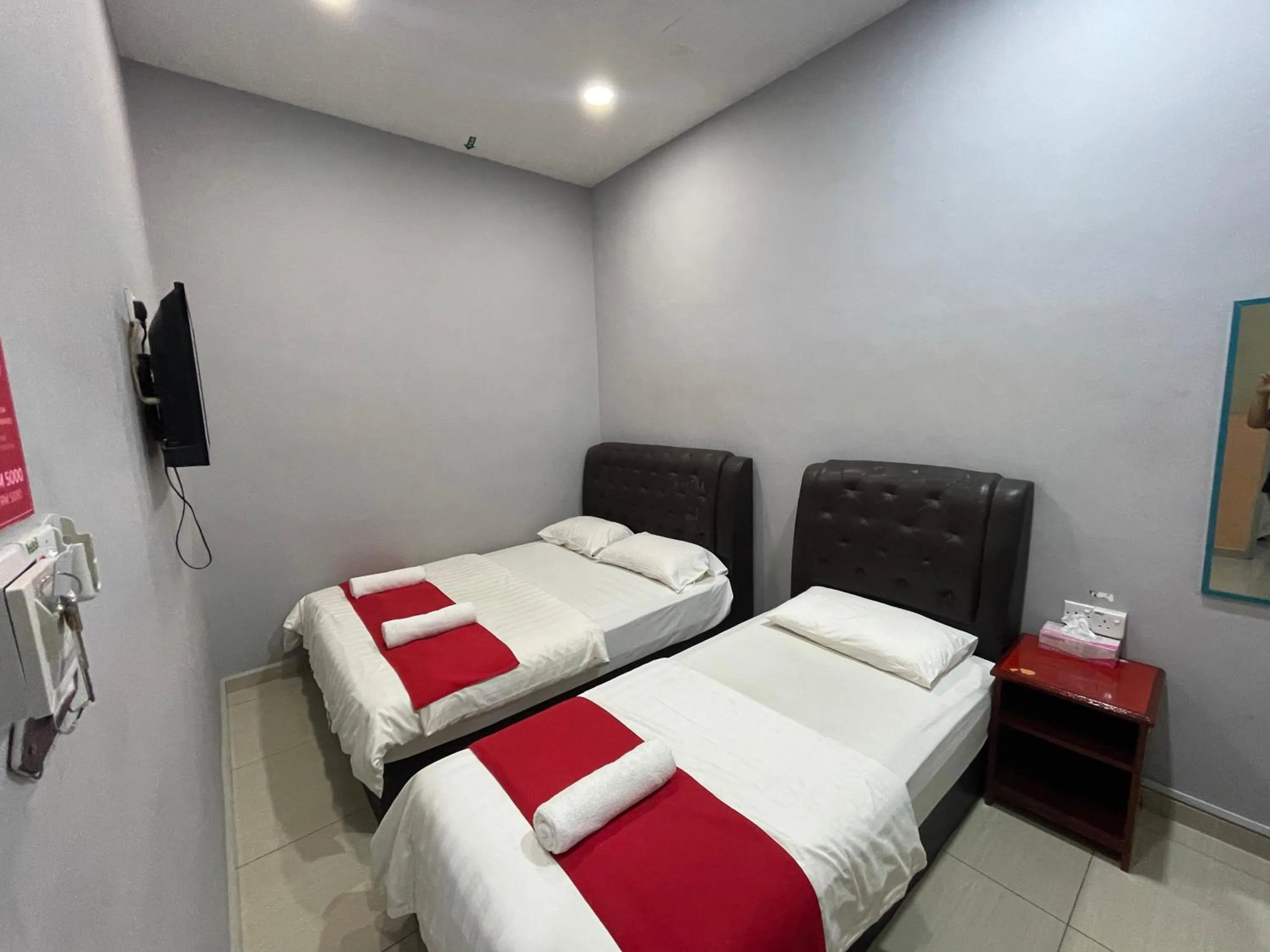 Bed in SZA INN HOTEL