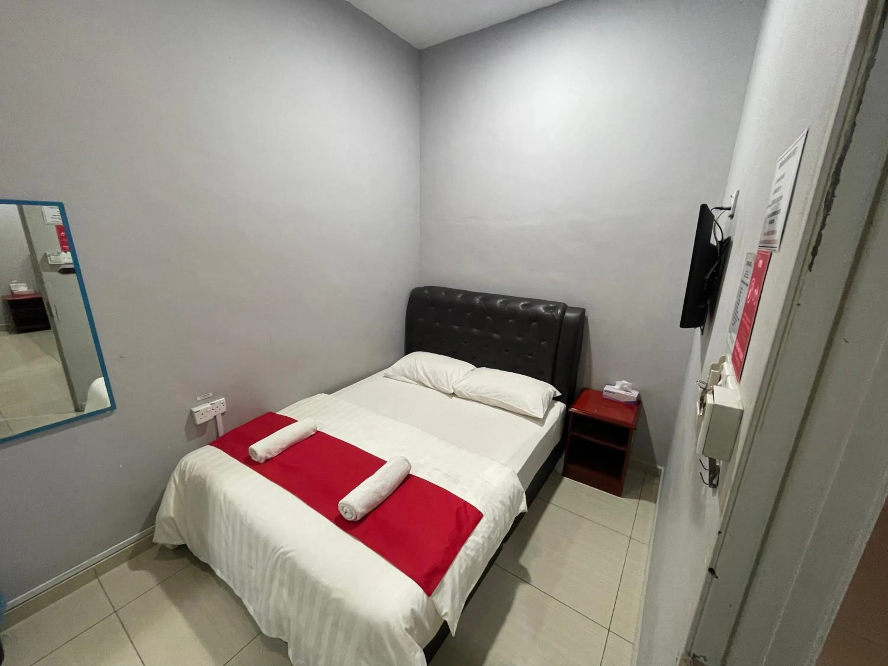 Bed in SZA INN HOTEL