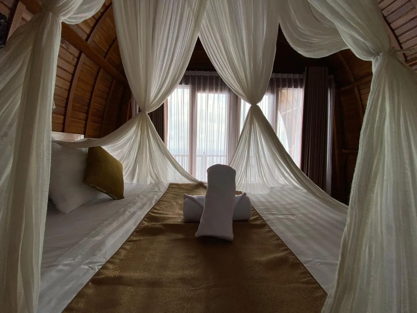 Bed in Suwehan Beach Cliff House by BIJAK