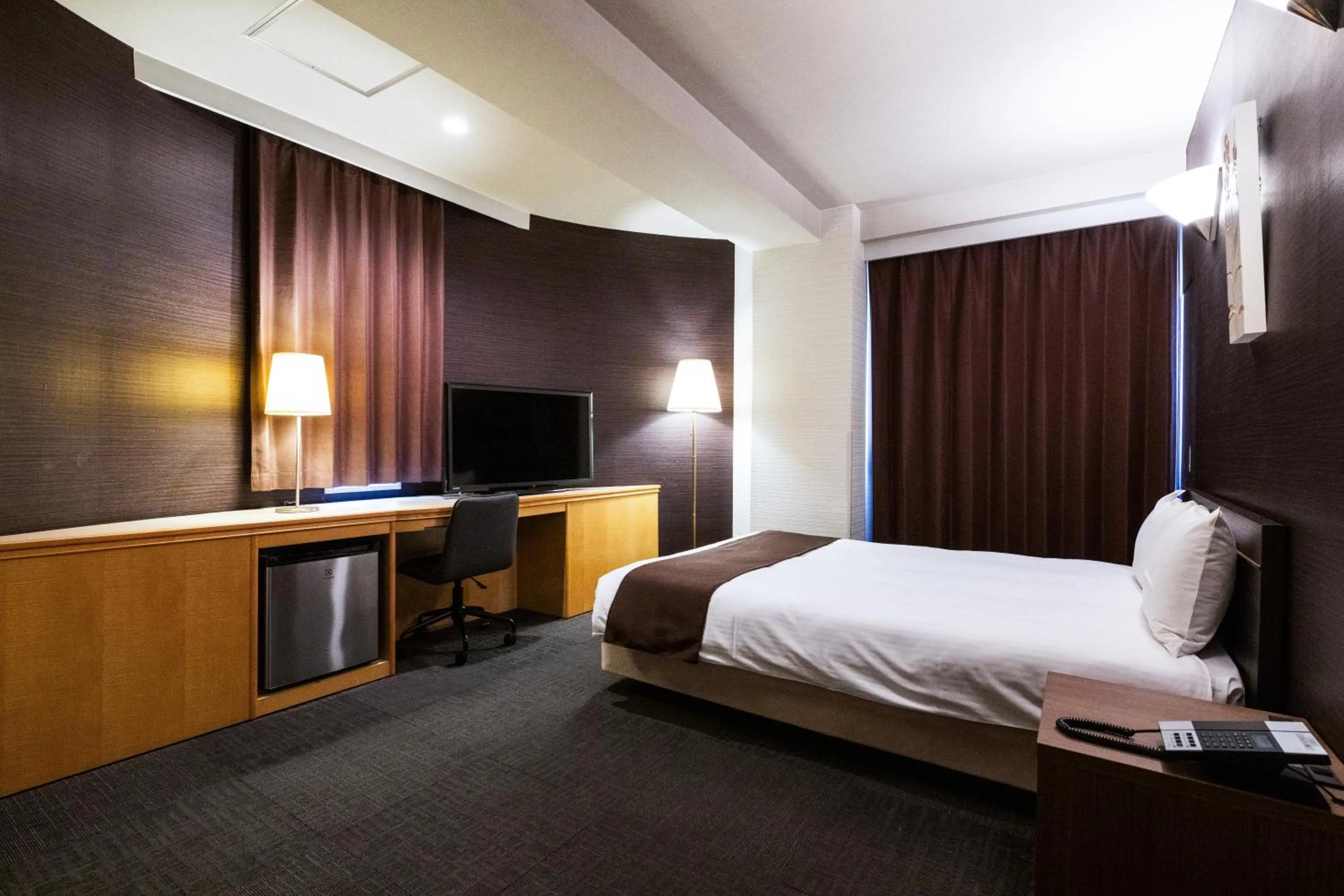 Photo of the whole room, Bed in Urvest Hotel Kamata