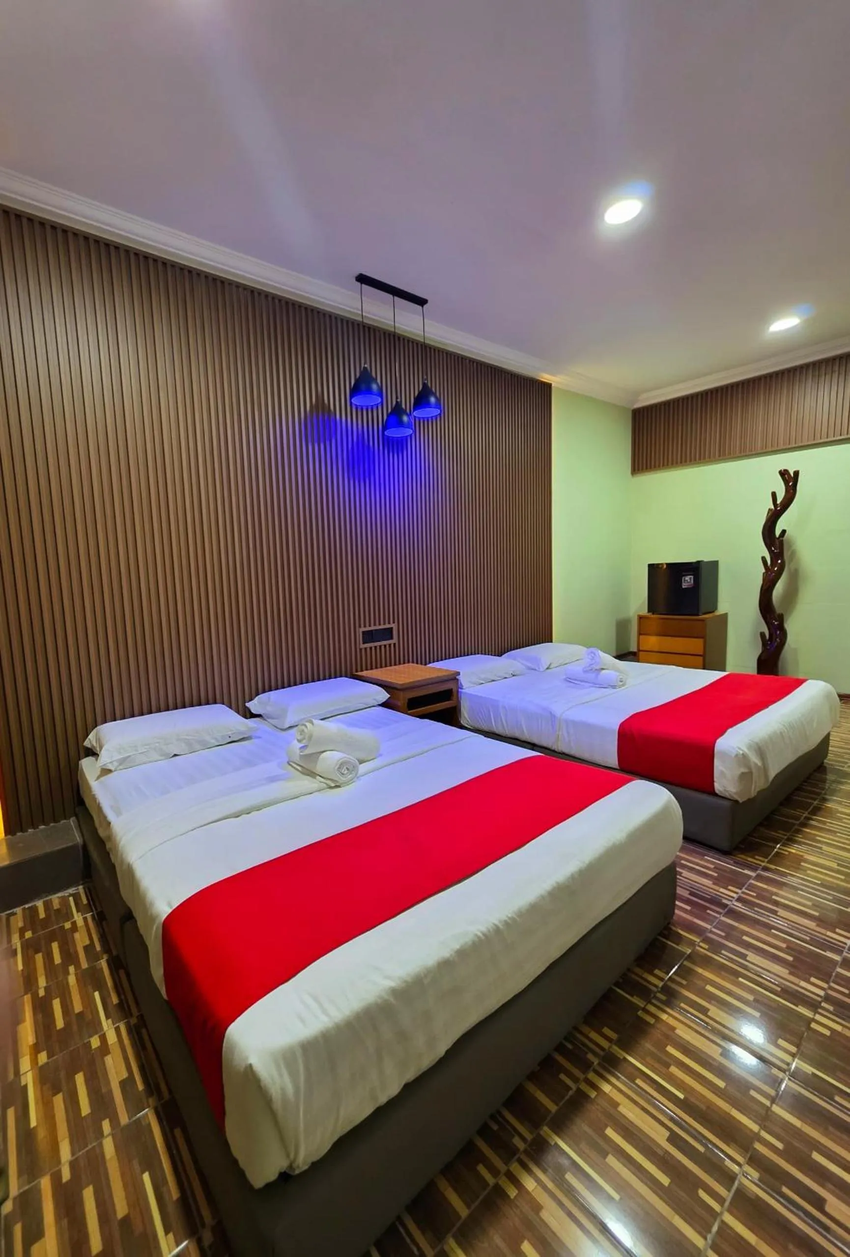 Bed in Grand Inn Hotel Semporna