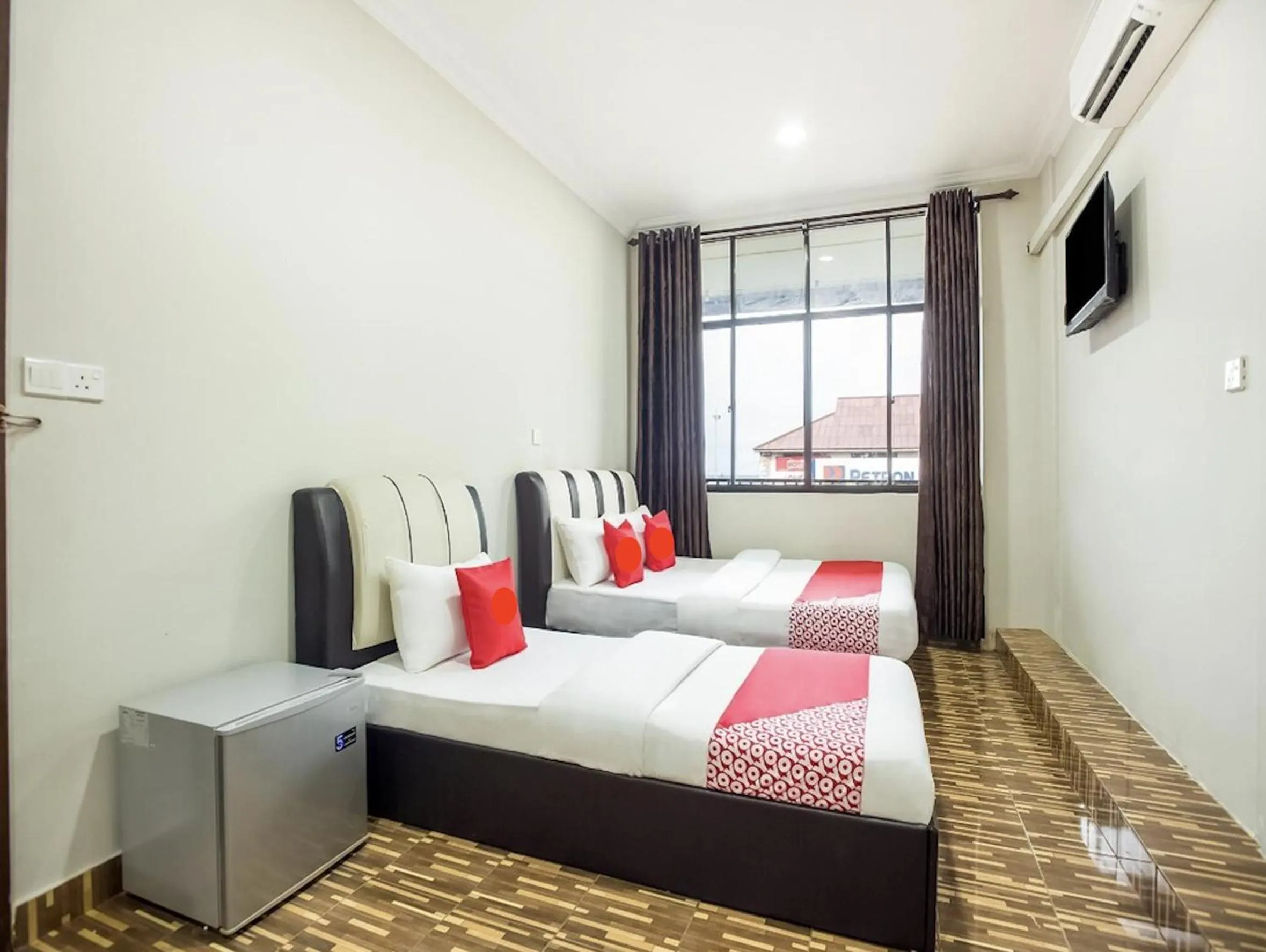 Bed in Grand Inn Hotel Semporna