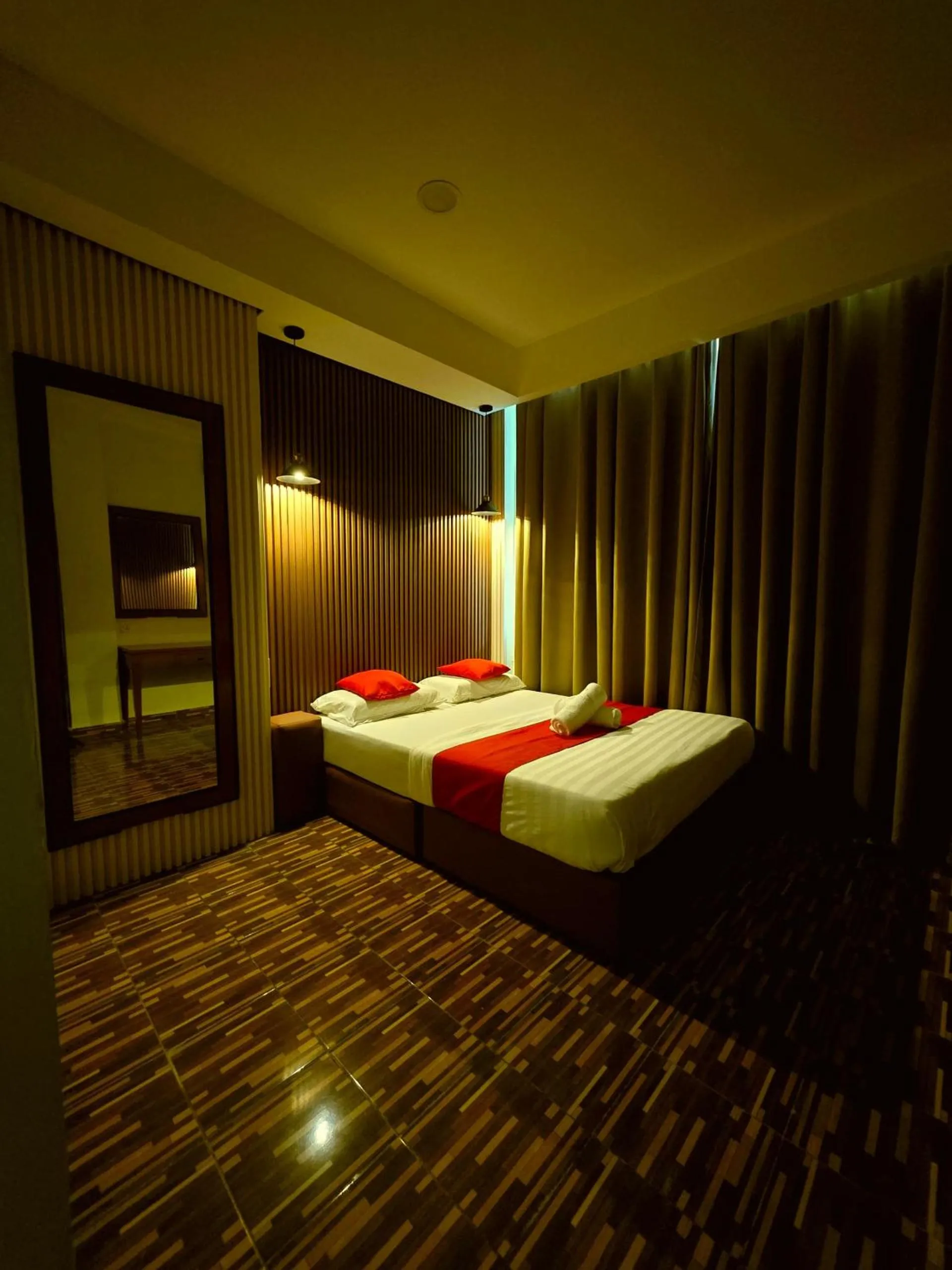 Bed in Grand Inn Hotel Semporna