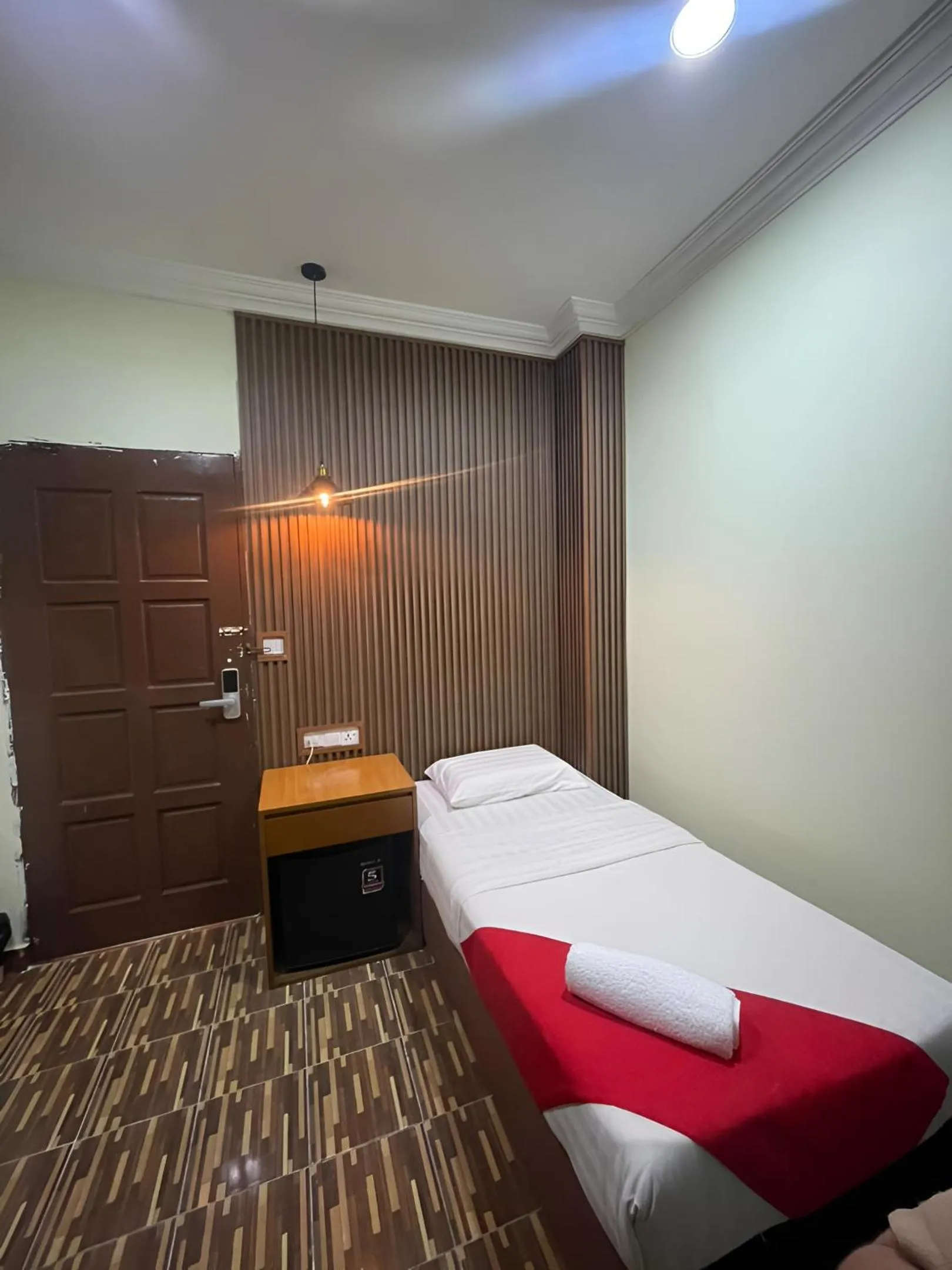 Bed in Grand Inn Hotel Semporna