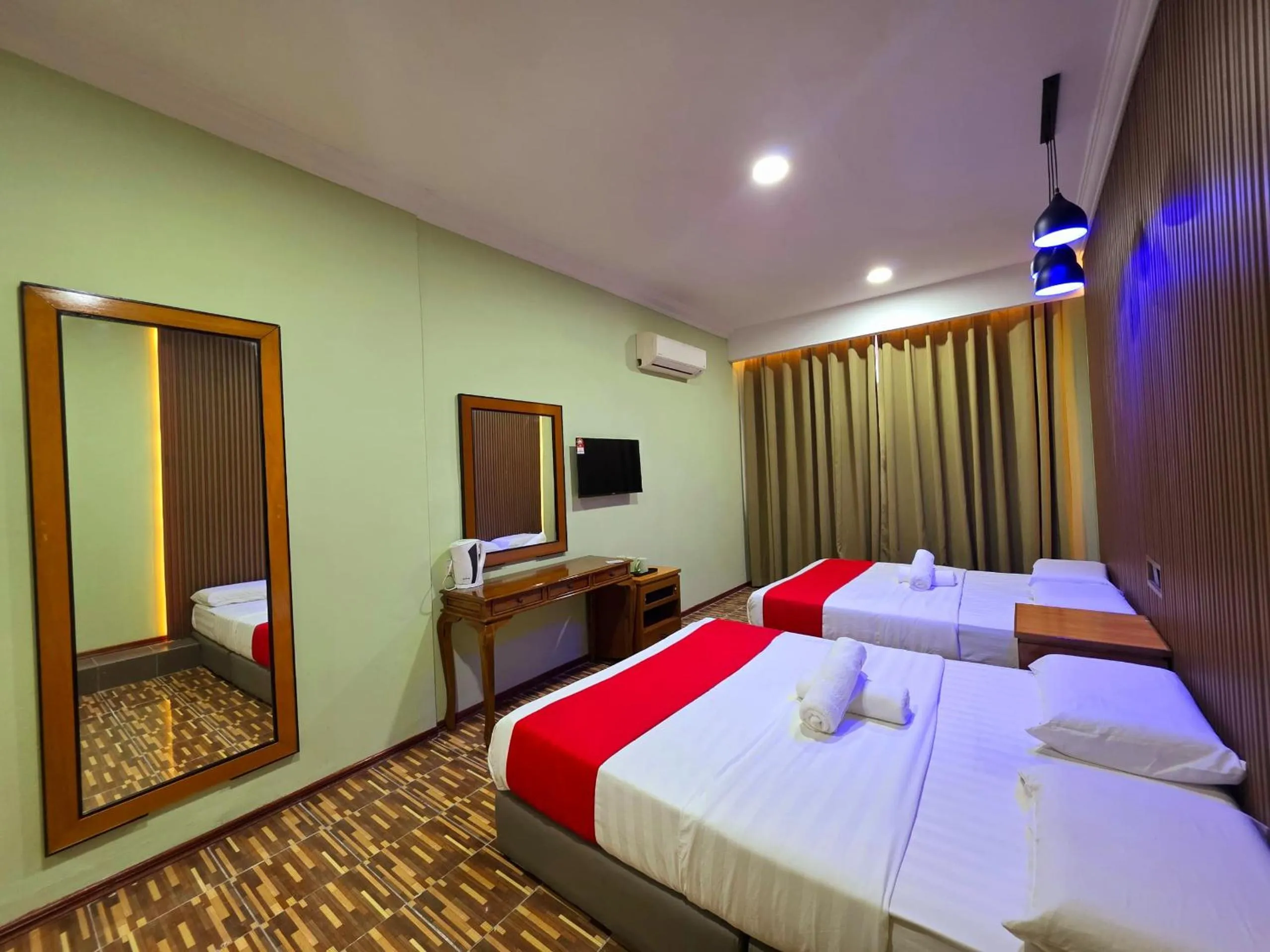 Bed in Grand Inn Hotel Semporna