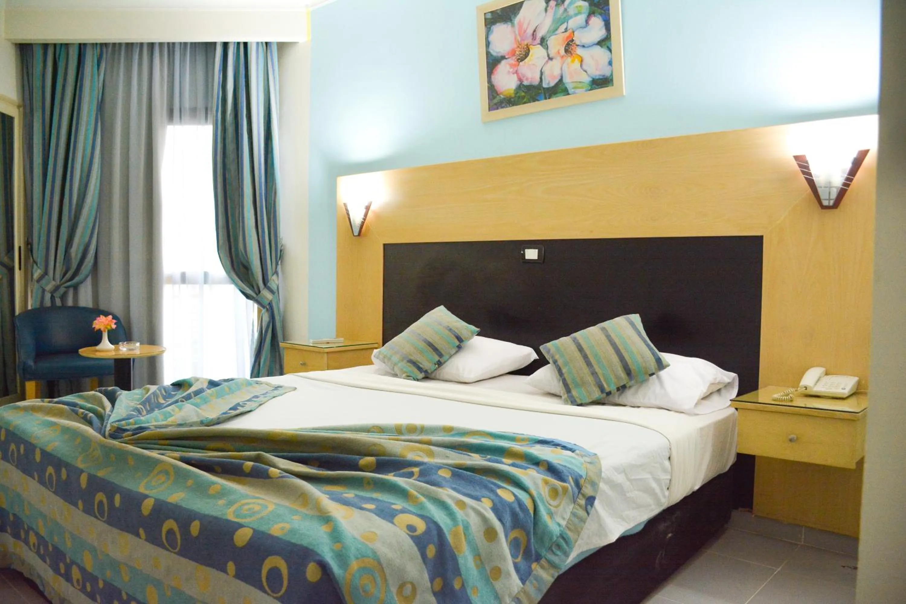 Bed in Aracan Pyramid Hotel