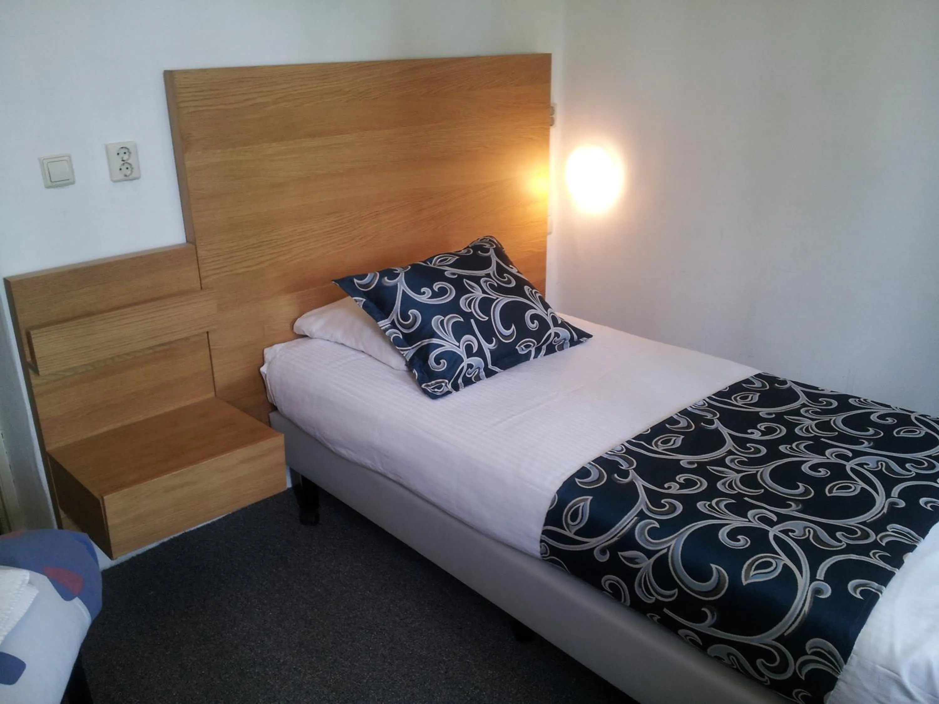 Bed in Hotel Holland Lodge