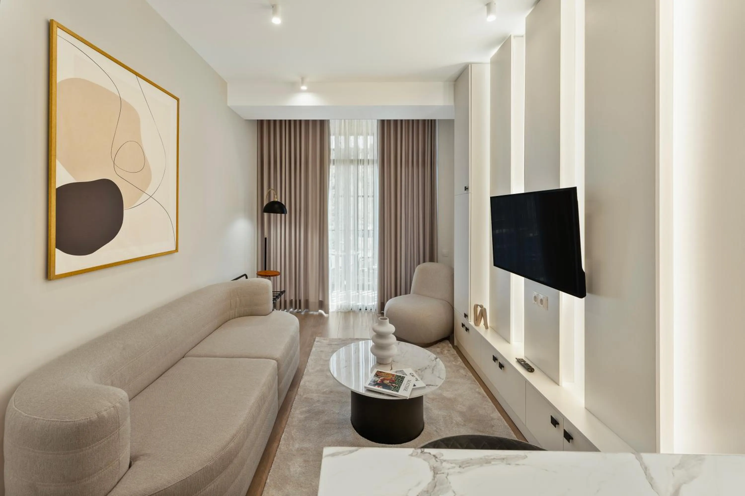 Communal lounge/ TV room in Solridge Aparthotel