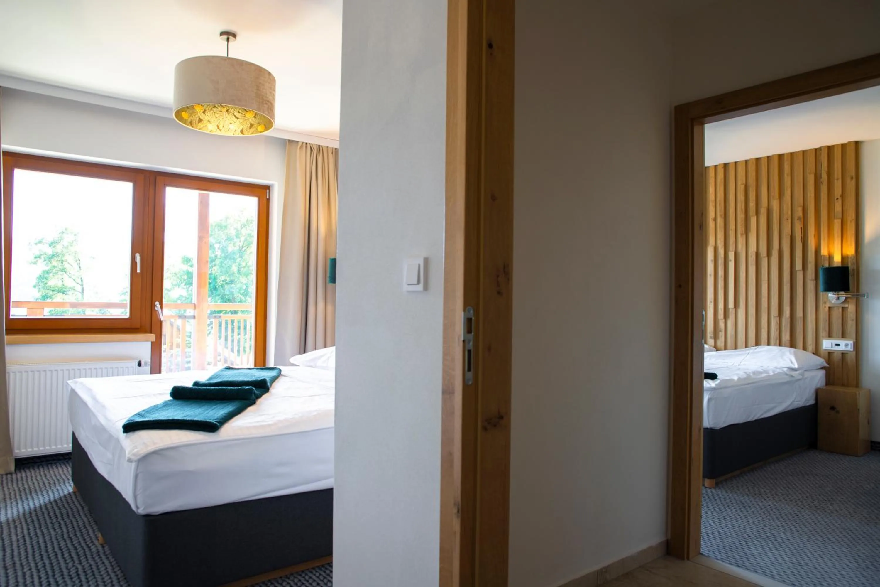 Bedroom, Bed in Amenity Hotel & Resort Lipno
