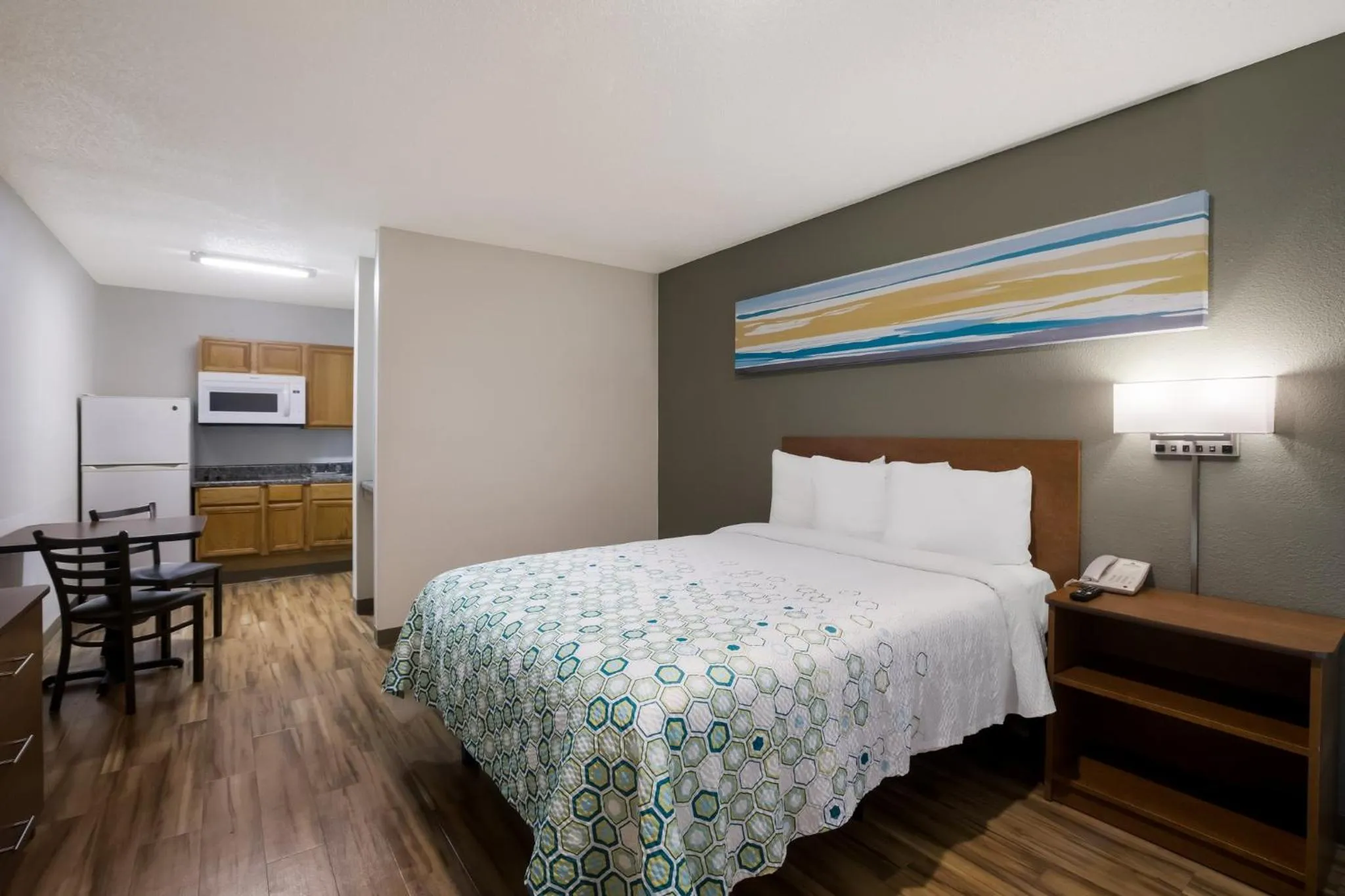 Bedroom, Bed in HomeTowne Studios by Red Roof Covington, GA