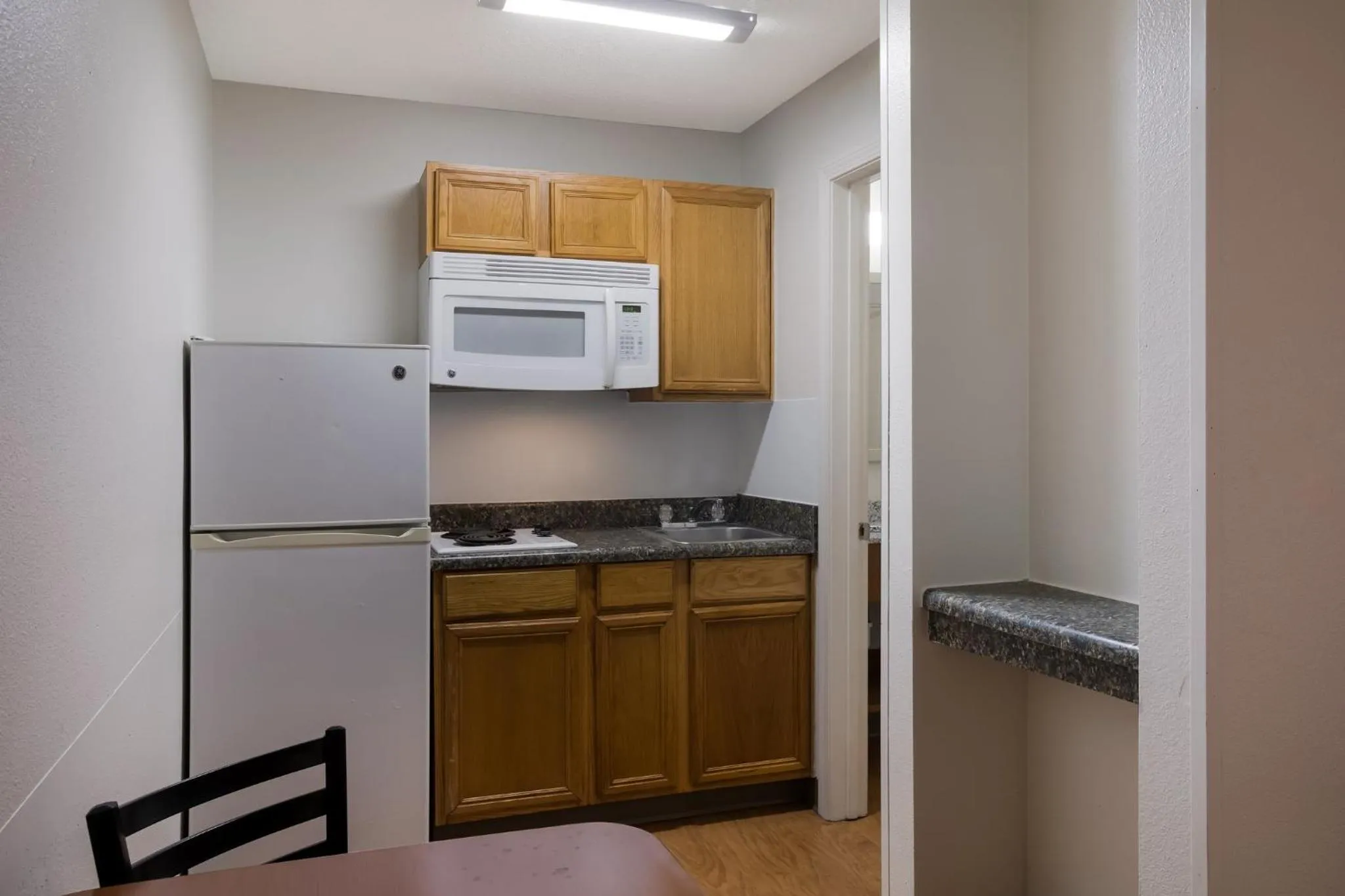 Bedroom in HomeTowne Studios by Red Roof Covington, GA