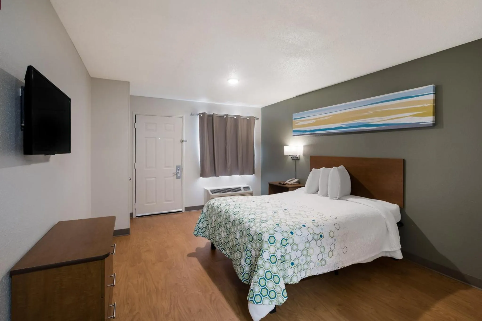 Bedroom, Bed in HomeTowne Studios by Red Roof Covington, GA