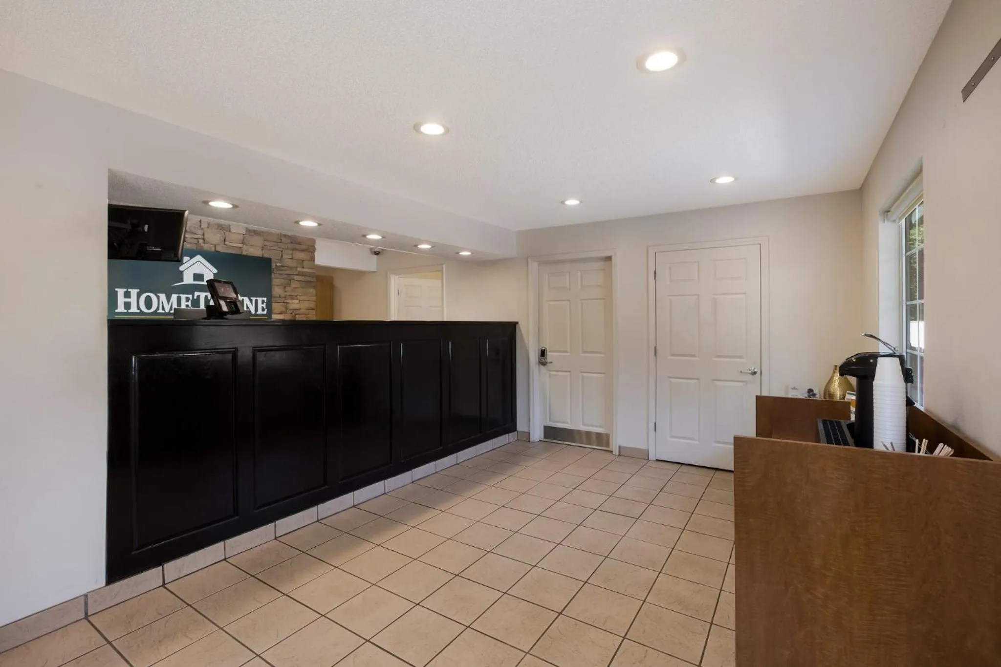 Lobby or reception in HomeTowne Studios by Red Roof Covington, GA