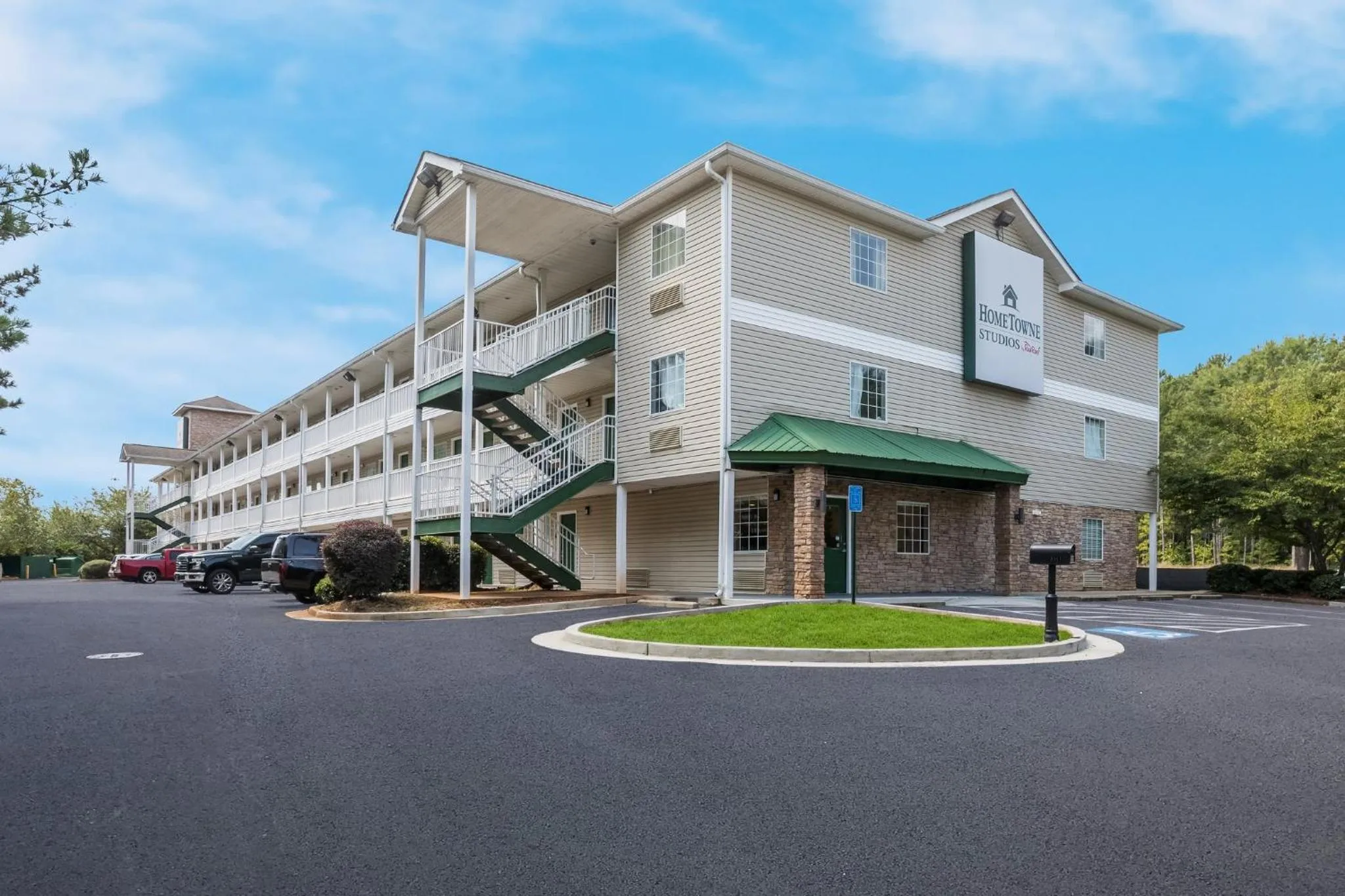 Property building in HomeTowne Studios by Red Roof Covington, GA