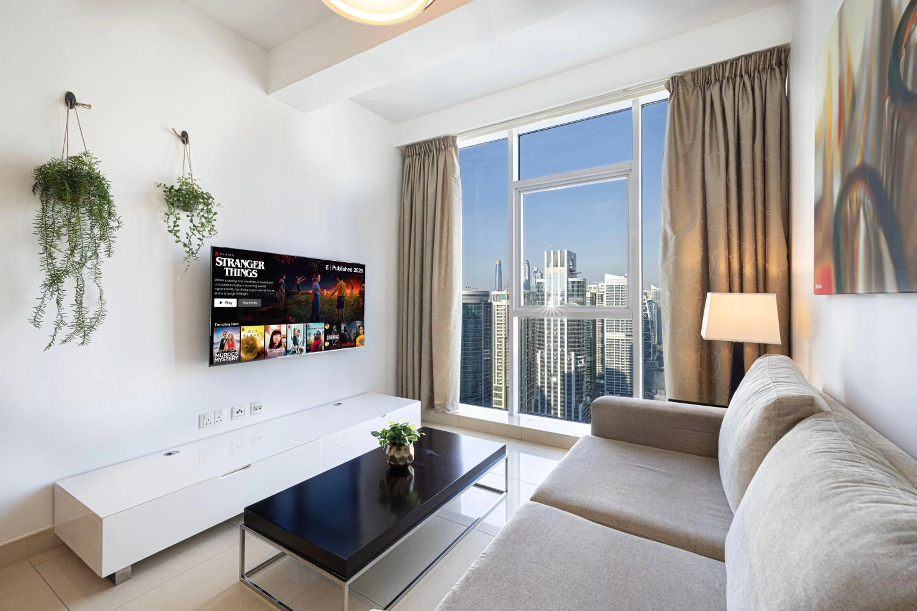 TV and multimedia in Whispers of the Wind by Lagom Vacation Homes