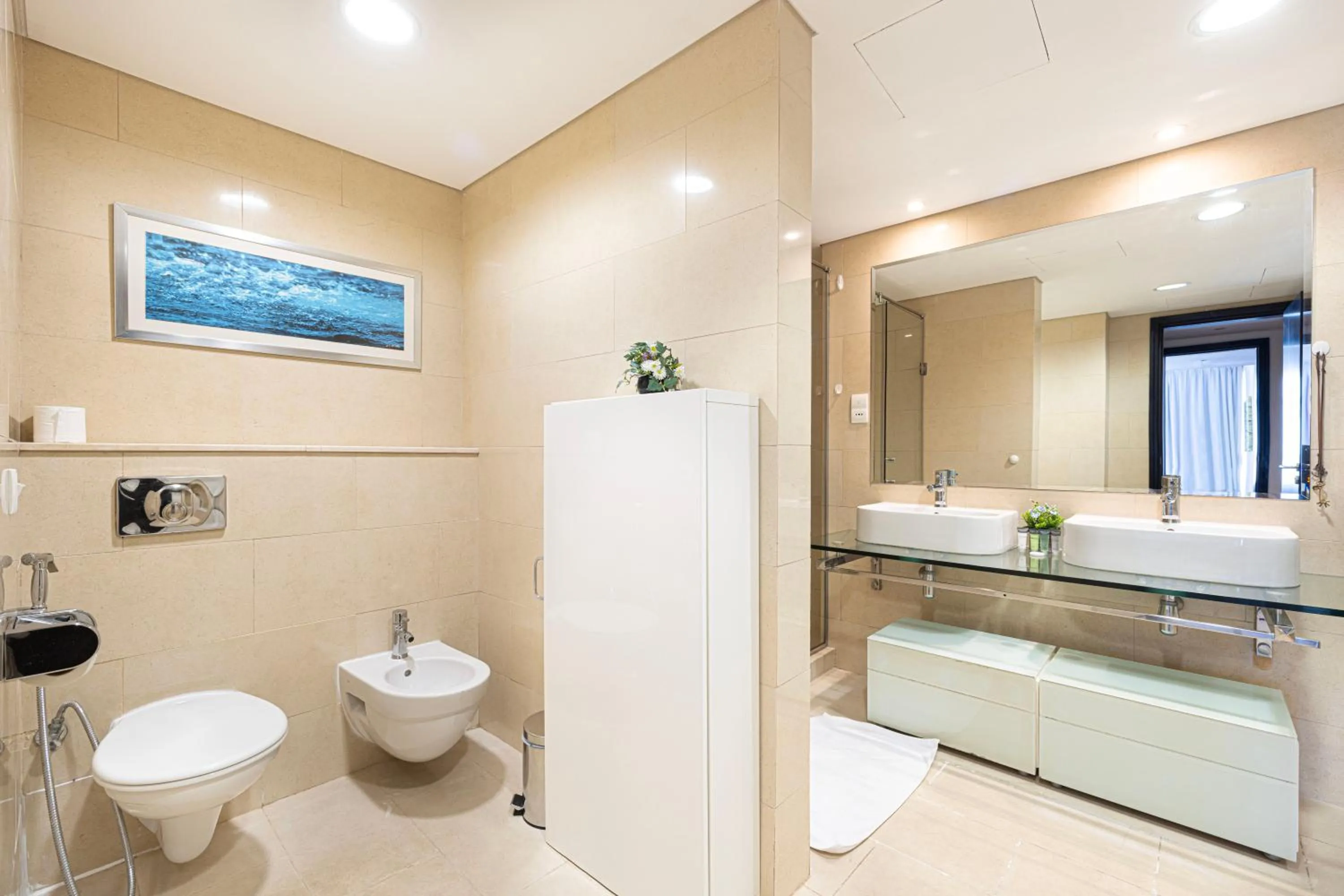 Bathroom in Whispers of the Wind by Lagom Vacation Homes