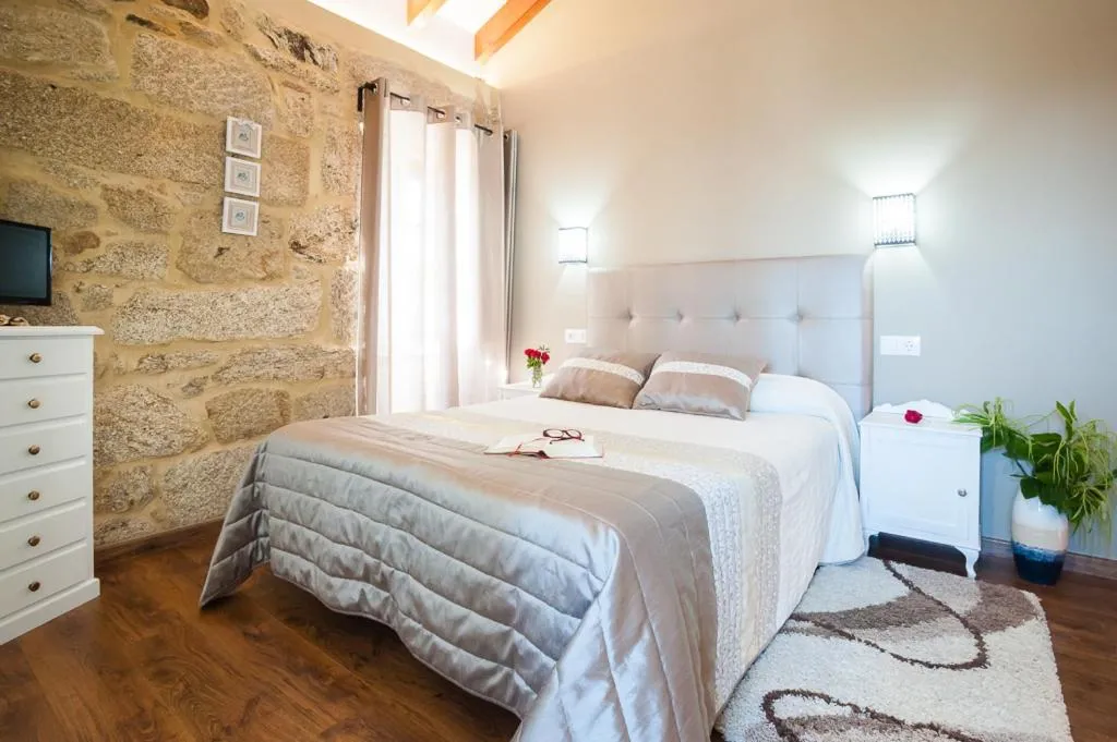 Bed in A Cantaruxa Maruxa Turismo Rural