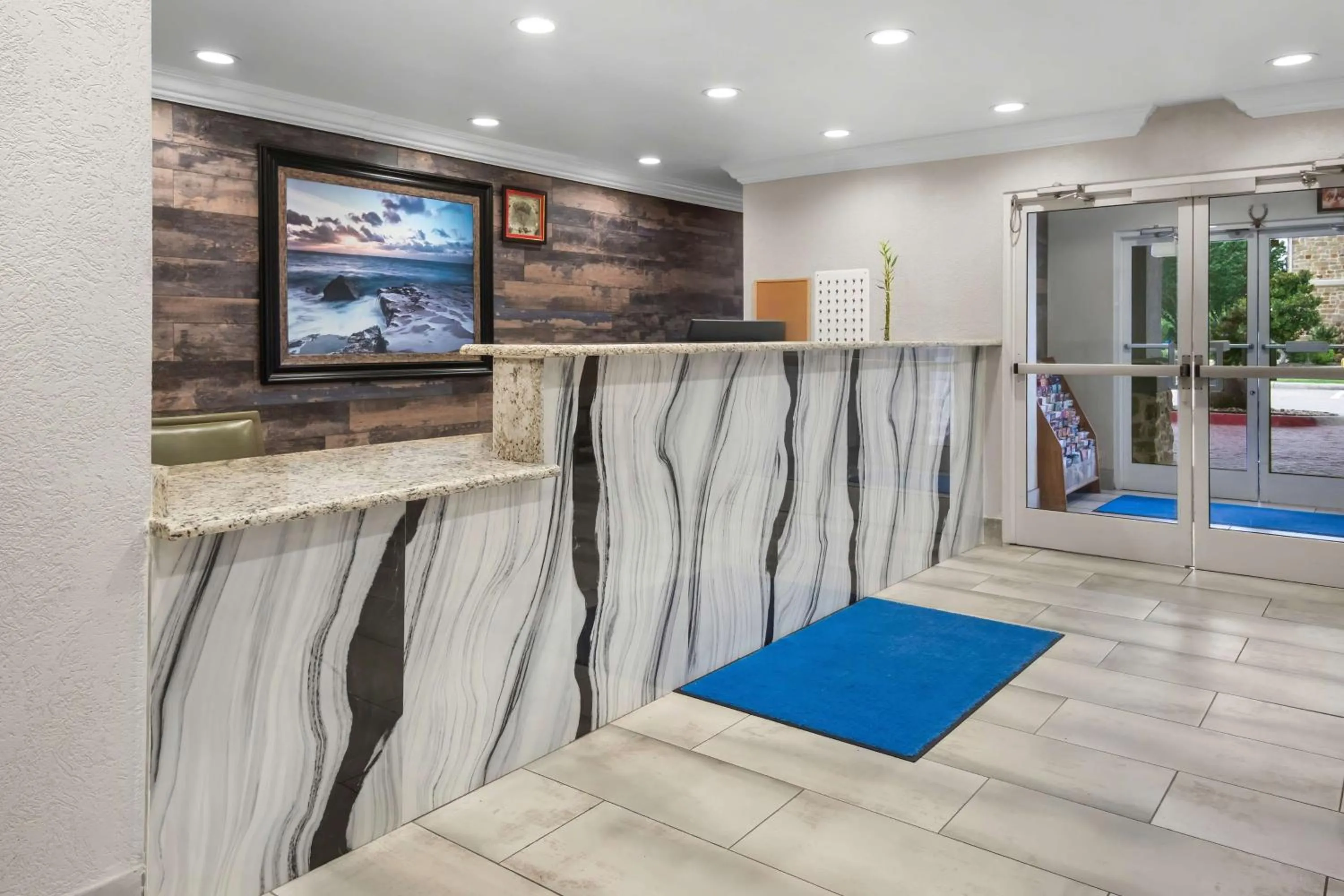 Lobby or reception in SureStay Plus by Best Western Fort Worth Benbrook