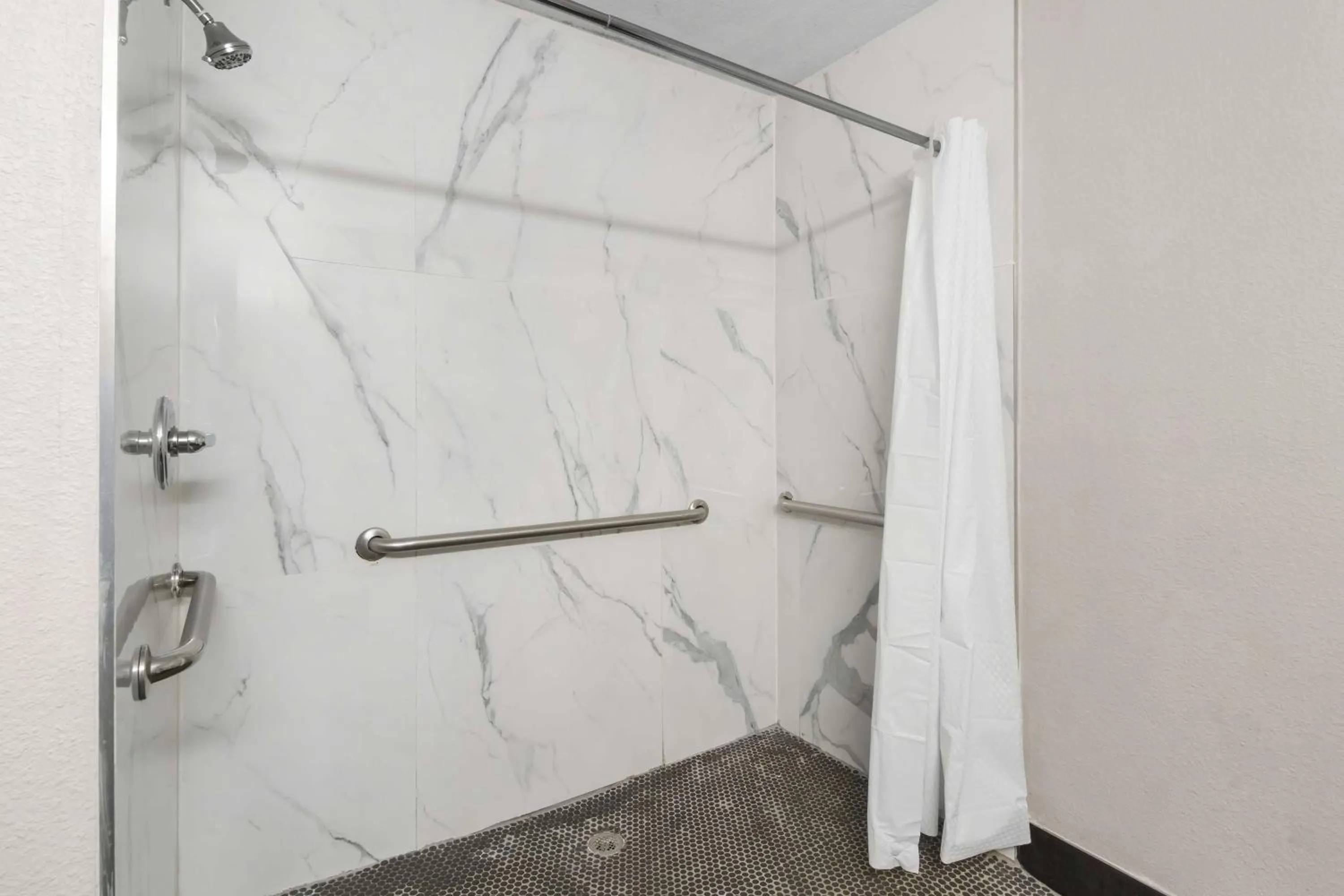 Bathroom in SureStay Plus by Best Western Fort Worth Benbrook