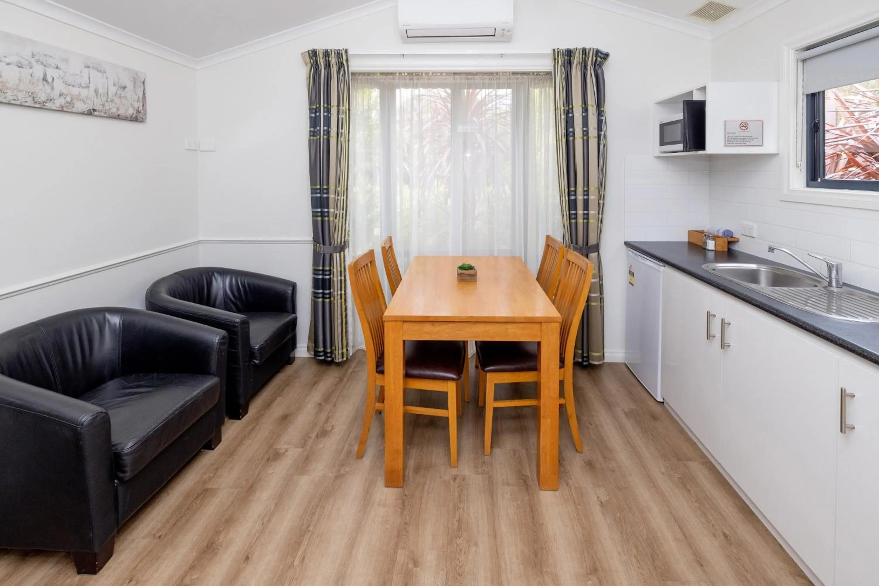 Living room in BIG4 Emu Beach Holiday Park