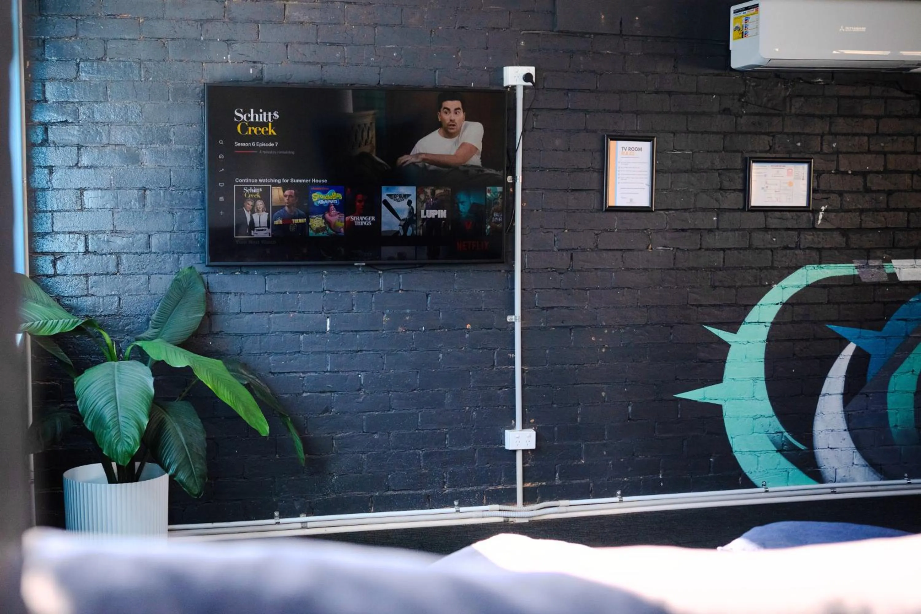 Communal lounge/ TV room in Summer House Brisbane