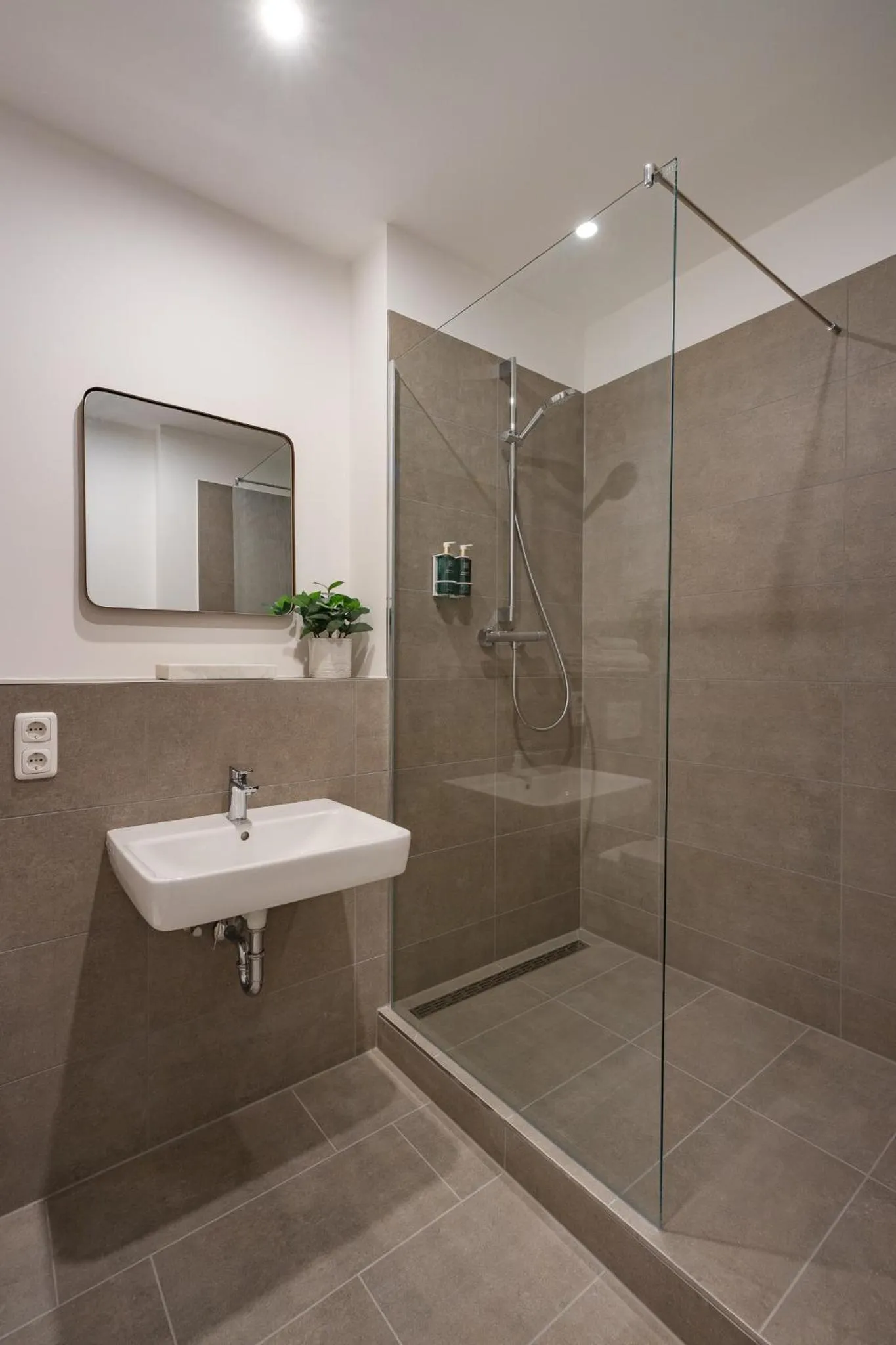 Bathroom in kalm stay - a design Aparthotel