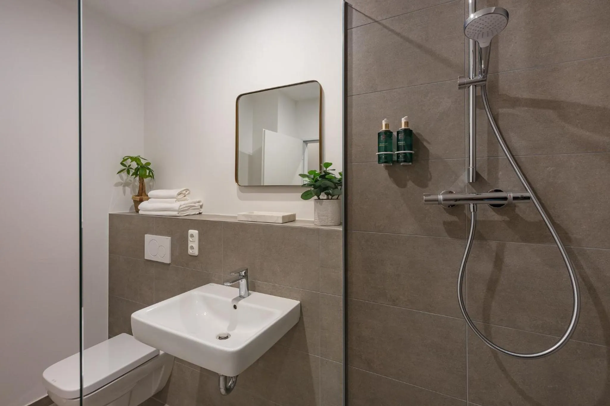 Bathroom in kalm stay - a design Aparthotel