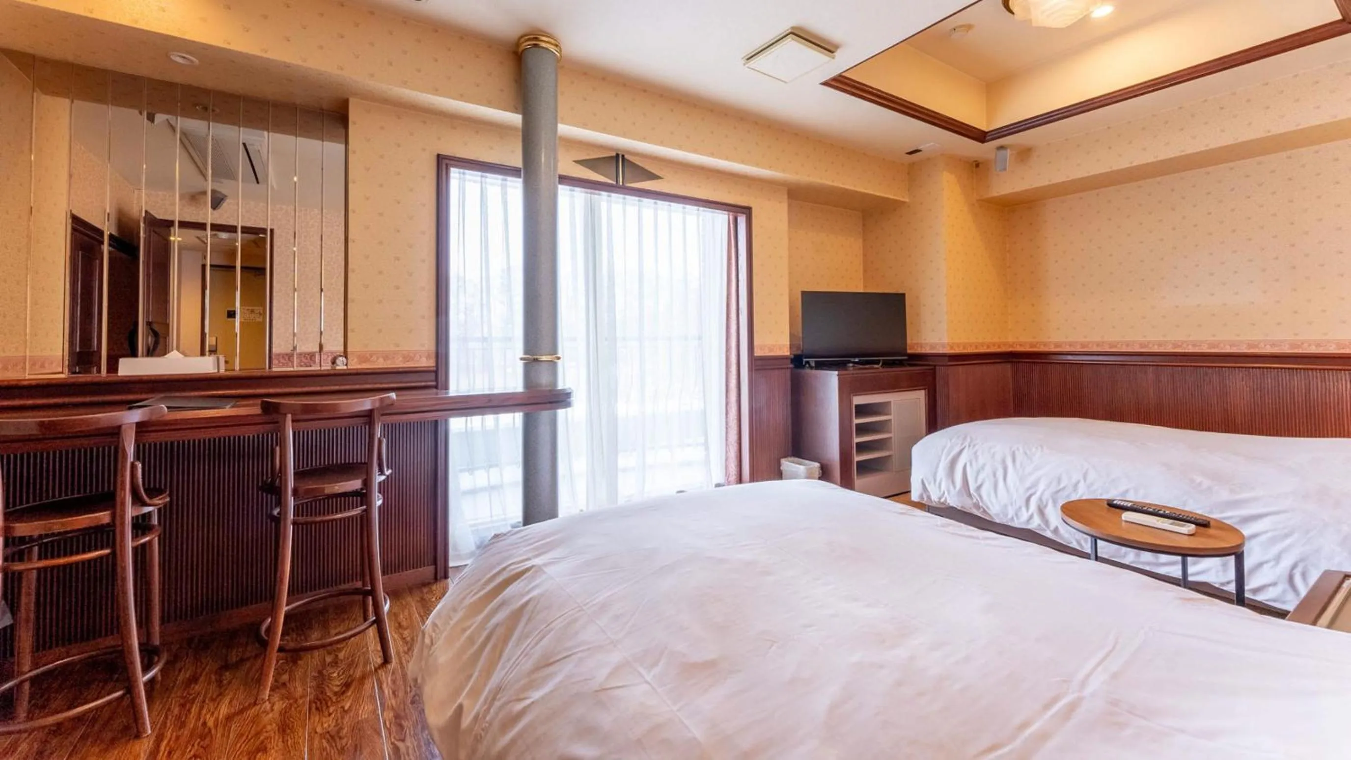 Bed in Tabist Shizukuishi Resort Hotel