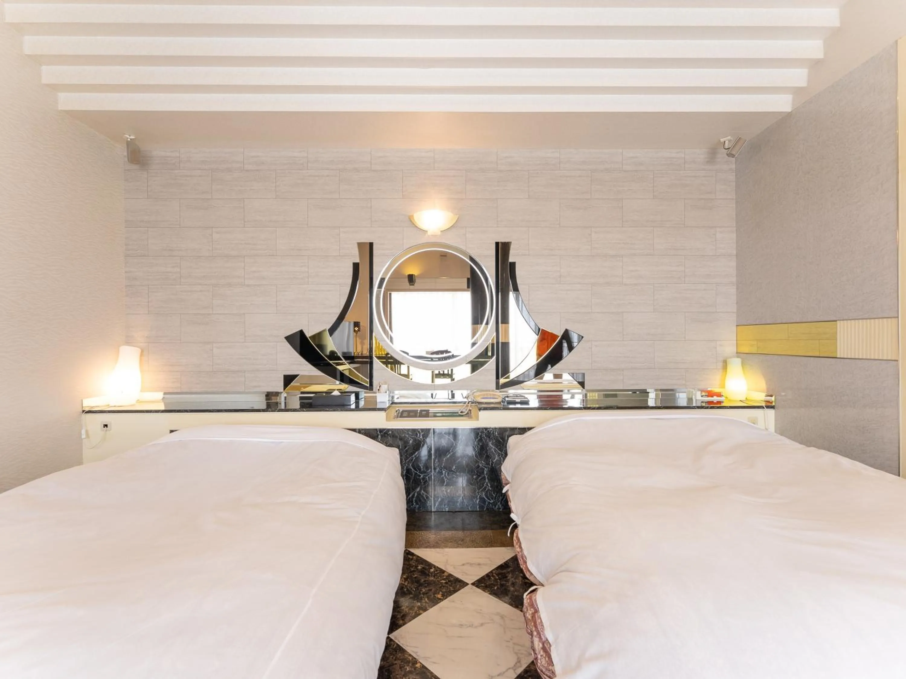 Bed in Tabist Shizukuishi Resort Hotel